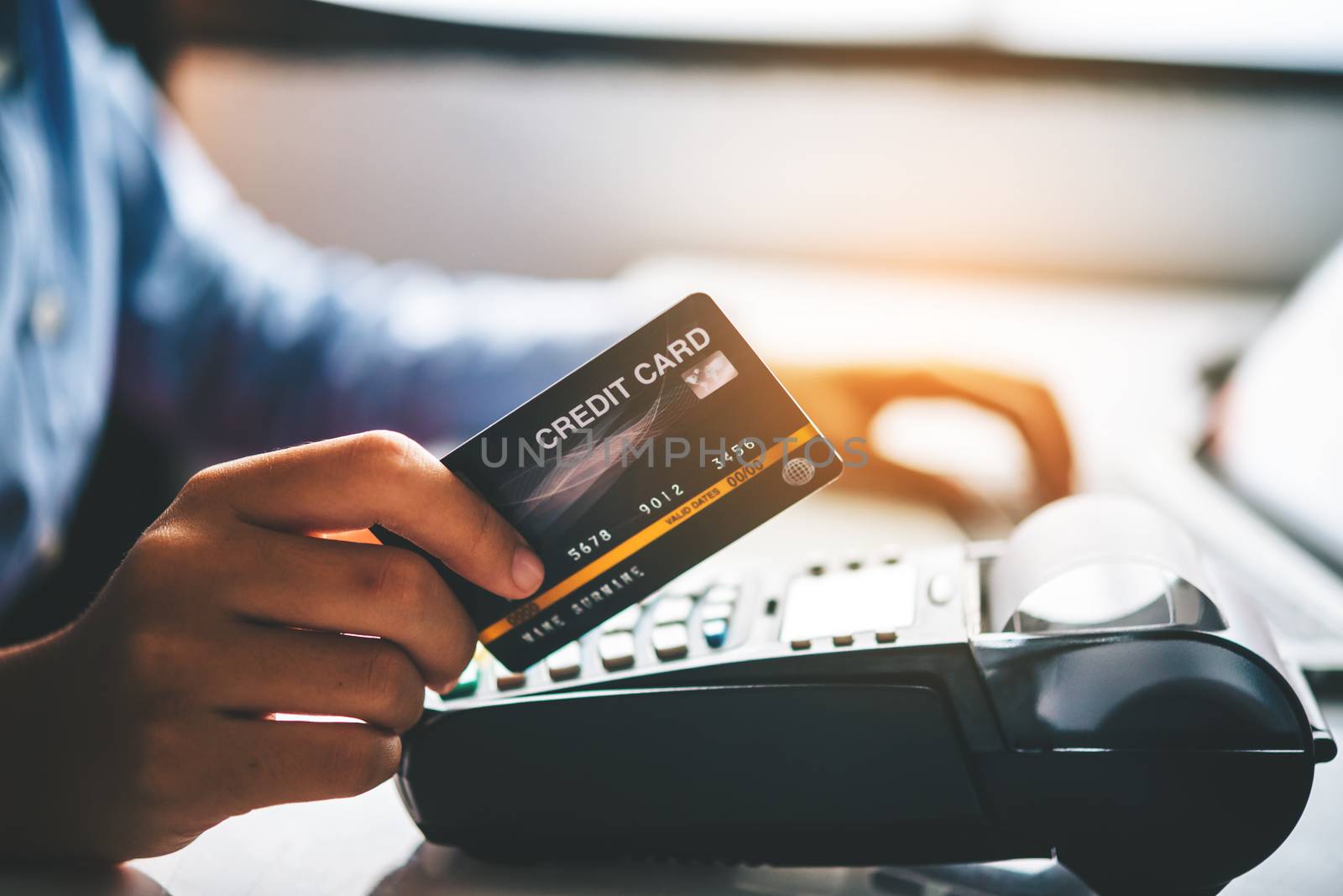Paying by credit card , buying and selling products using a cred by photobyphotoboy