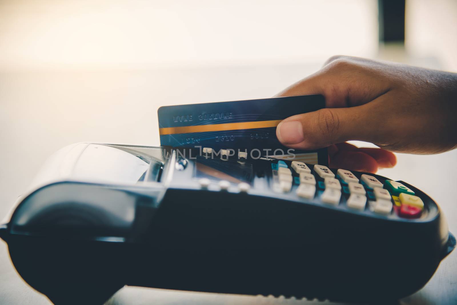 Paying by credit card , buying and selling products using a cred by photobyphotoboy