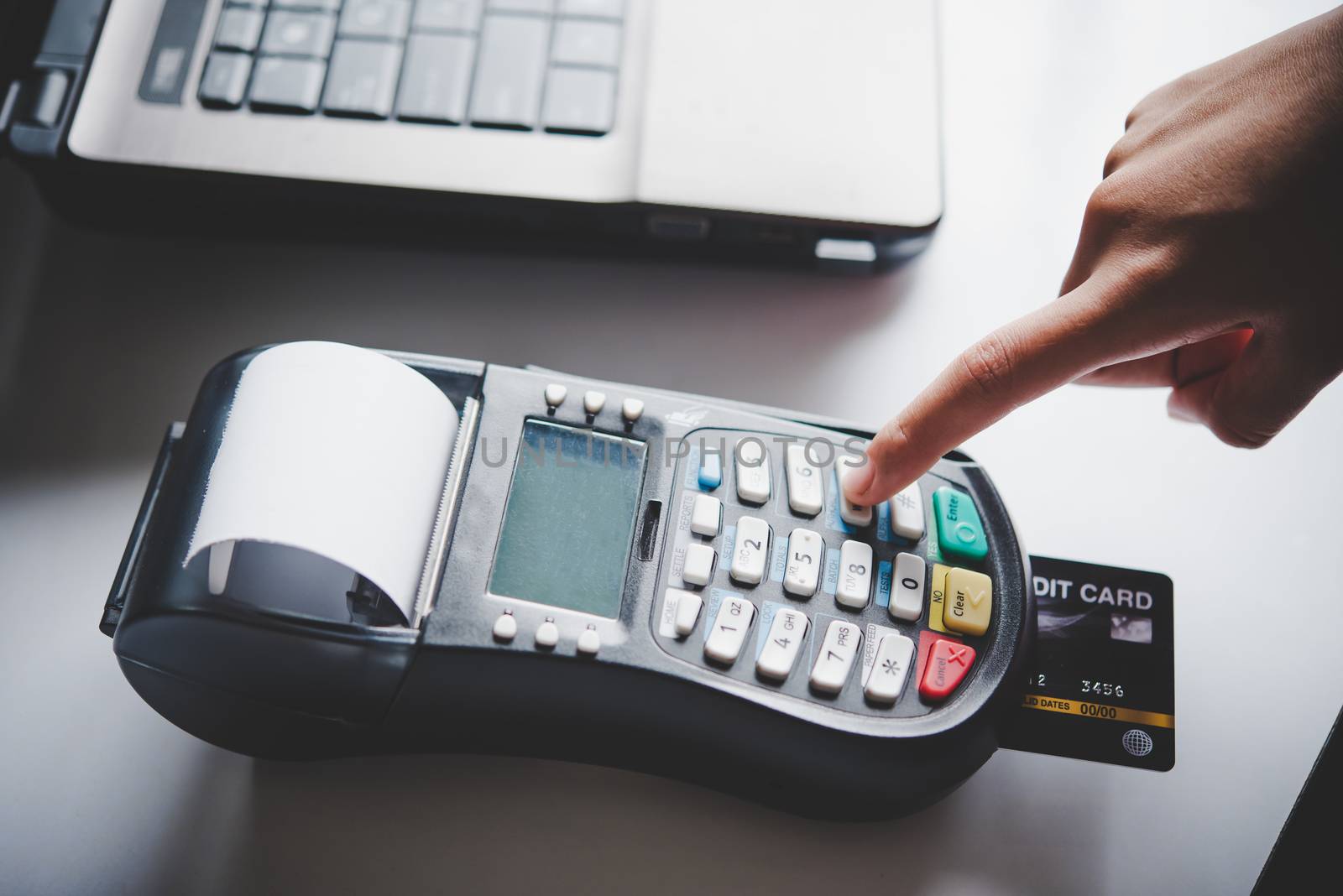 Paying by credit card , buying and selling products using a credit card swipe machine