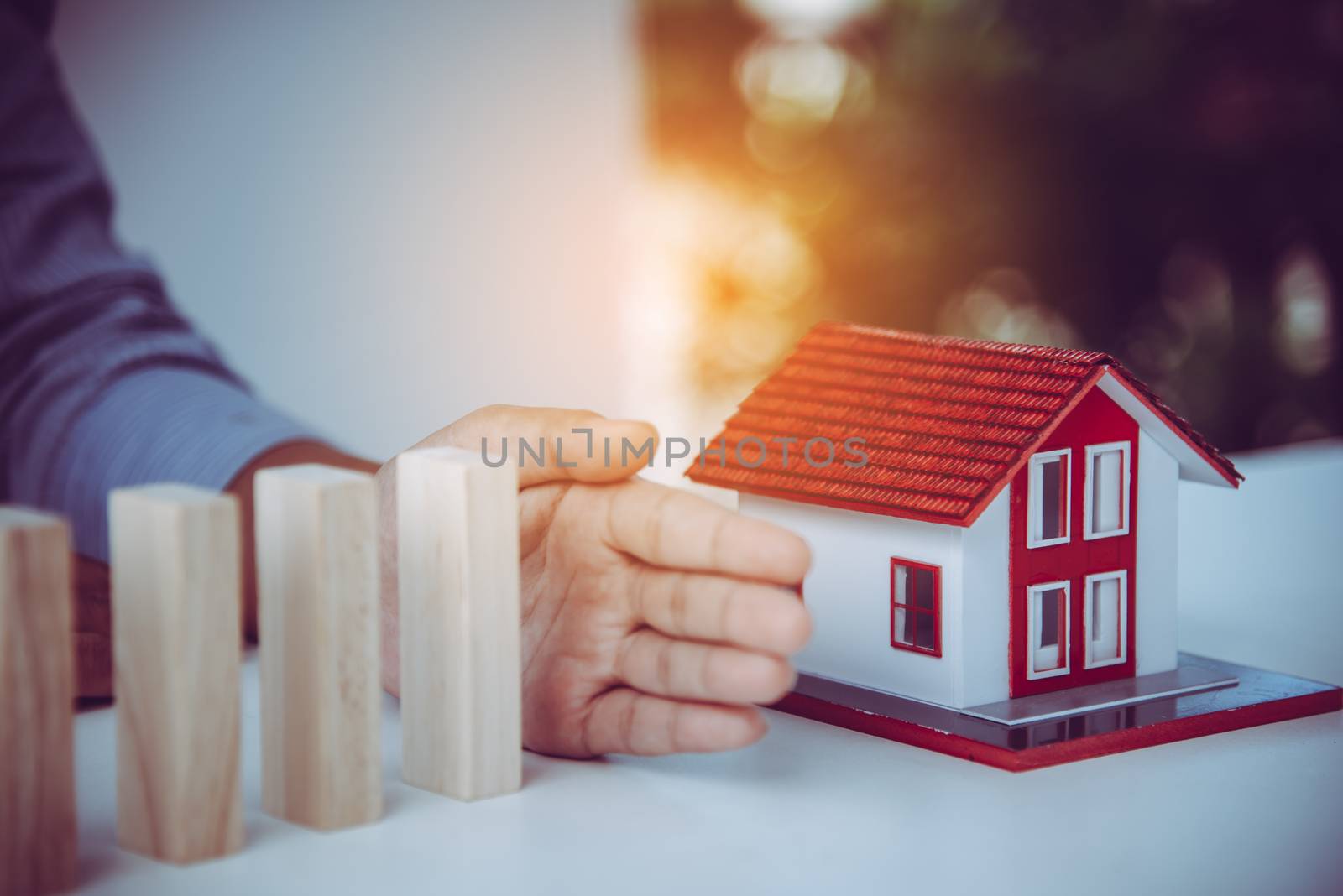  hand stopping risk the wooden blocks from falling on house, Hom by photobyphotoboy