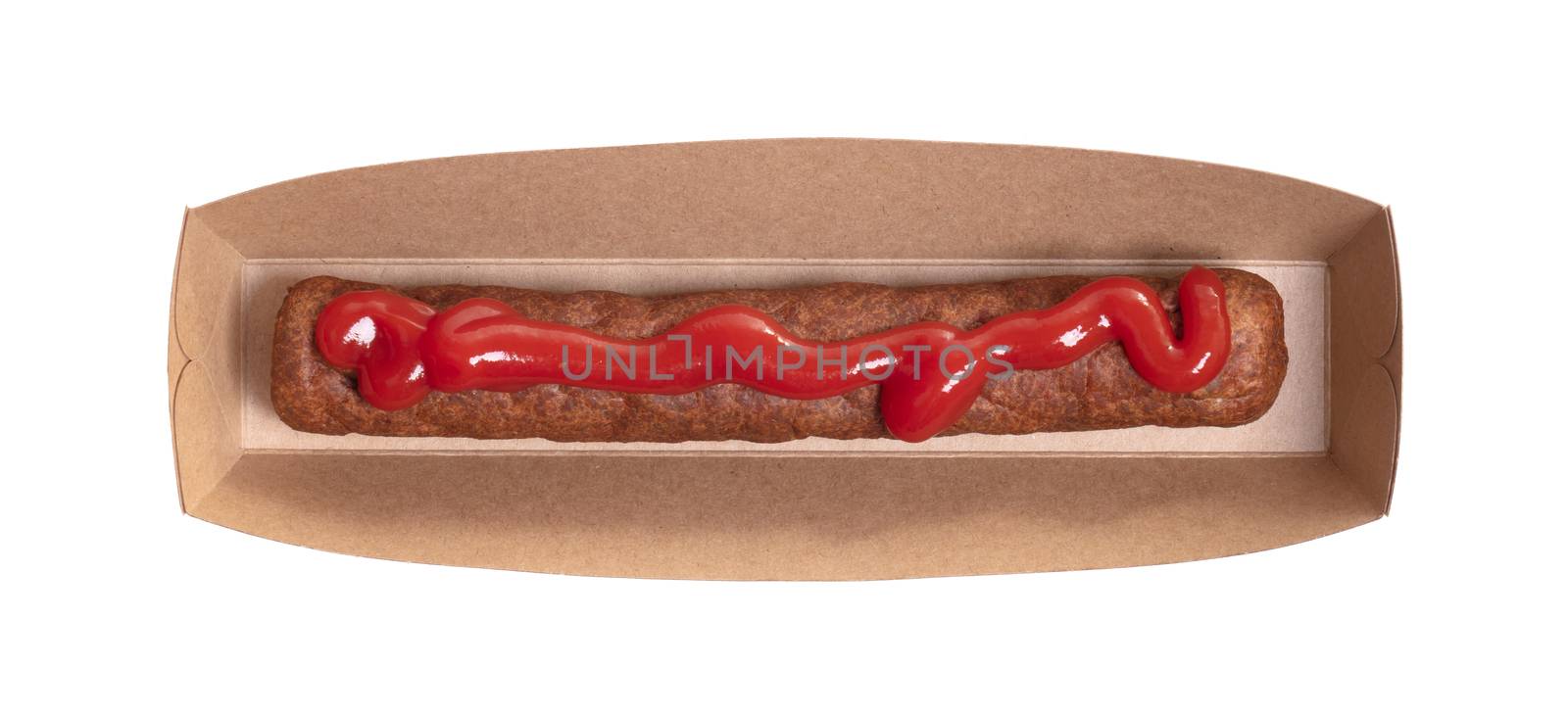 One frikadel with ketchup, a Dutch fast food snack on a paper tray