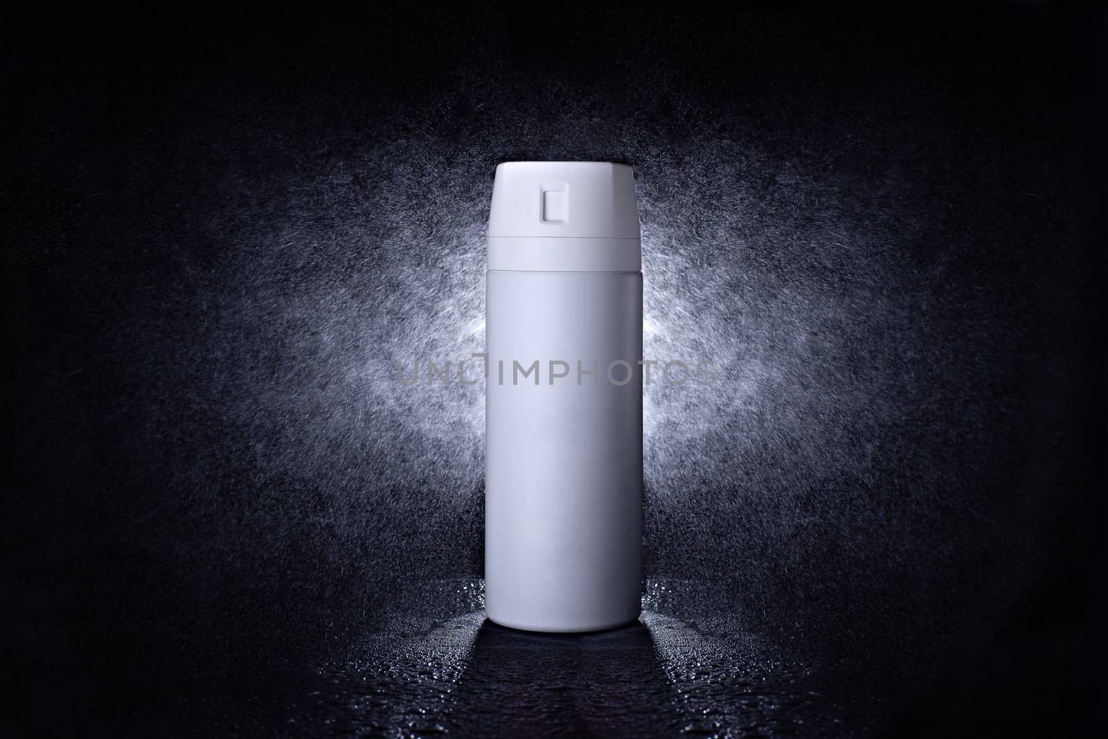 Deodorant in a white metal can on a black background with splash by Opikanets