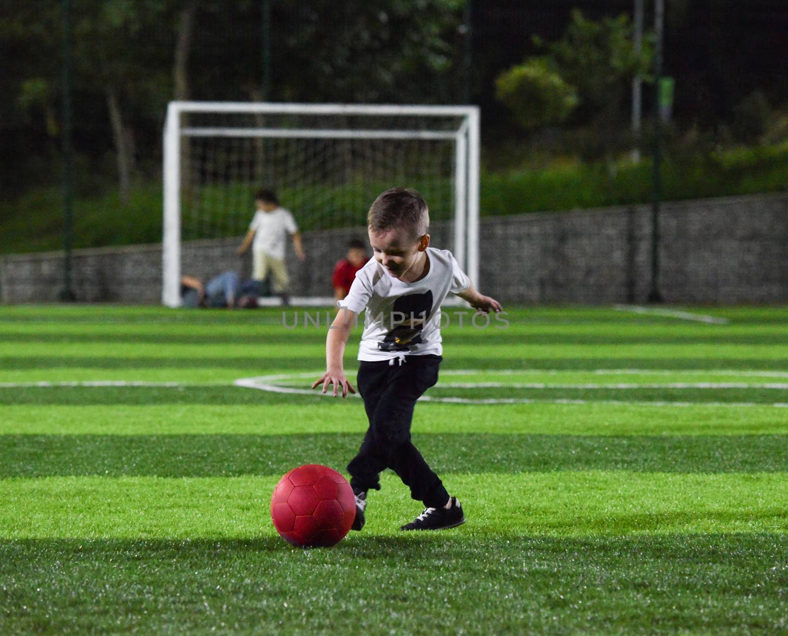 little boy playing ball by A_Karim