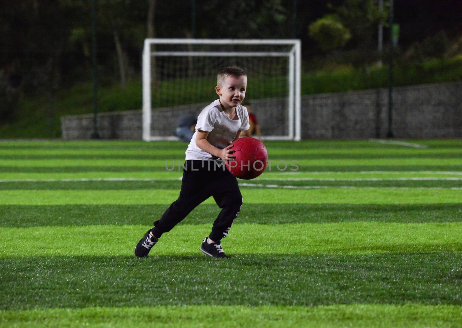 little boy playing ball by A_Karim
