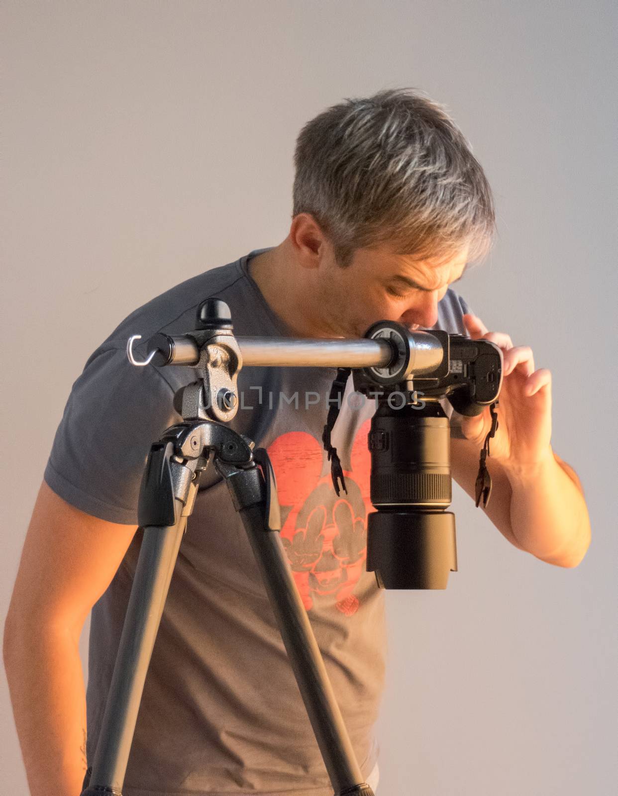 photographer in studio looking at camera. unintended photography