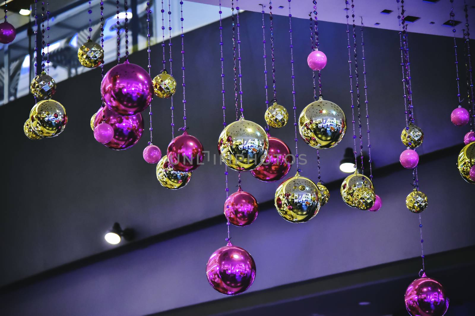 The christmas ball hangs beautifully during the festive season. by photobyphotoboy