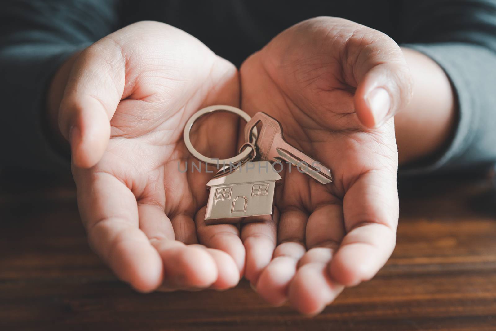 Holding house keys concept, house keys for new house, new house  by photobyphotoboy