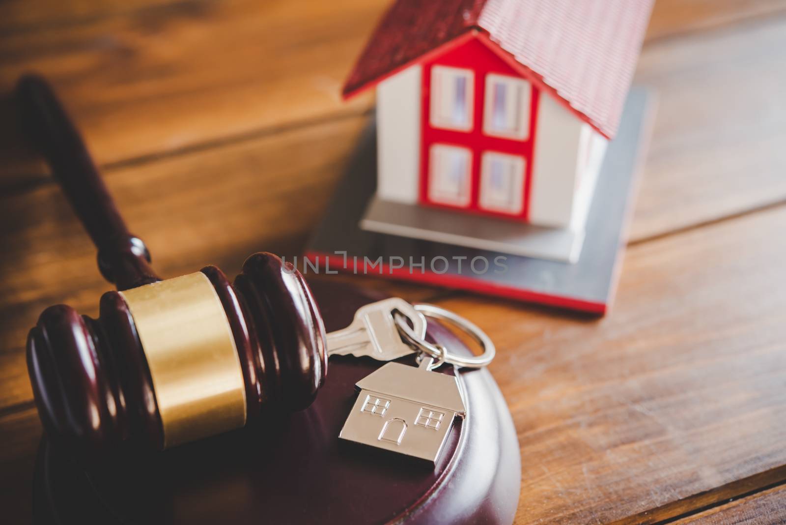 Model of house and gavel.House auction real estate law concept.  by photobyphotoboy