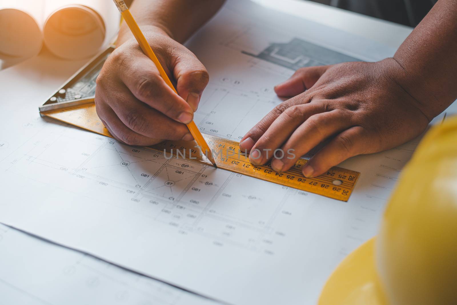  engineer working in office with blueprints, inspection in workp by photobyphotoboy