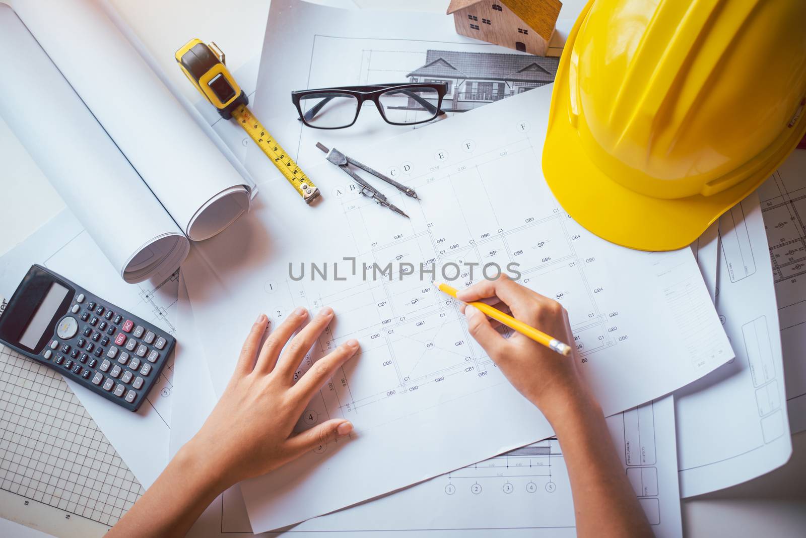  engineer working in office with blueprints, inspection in workplace for architectural plan, construction project ,Business construction 