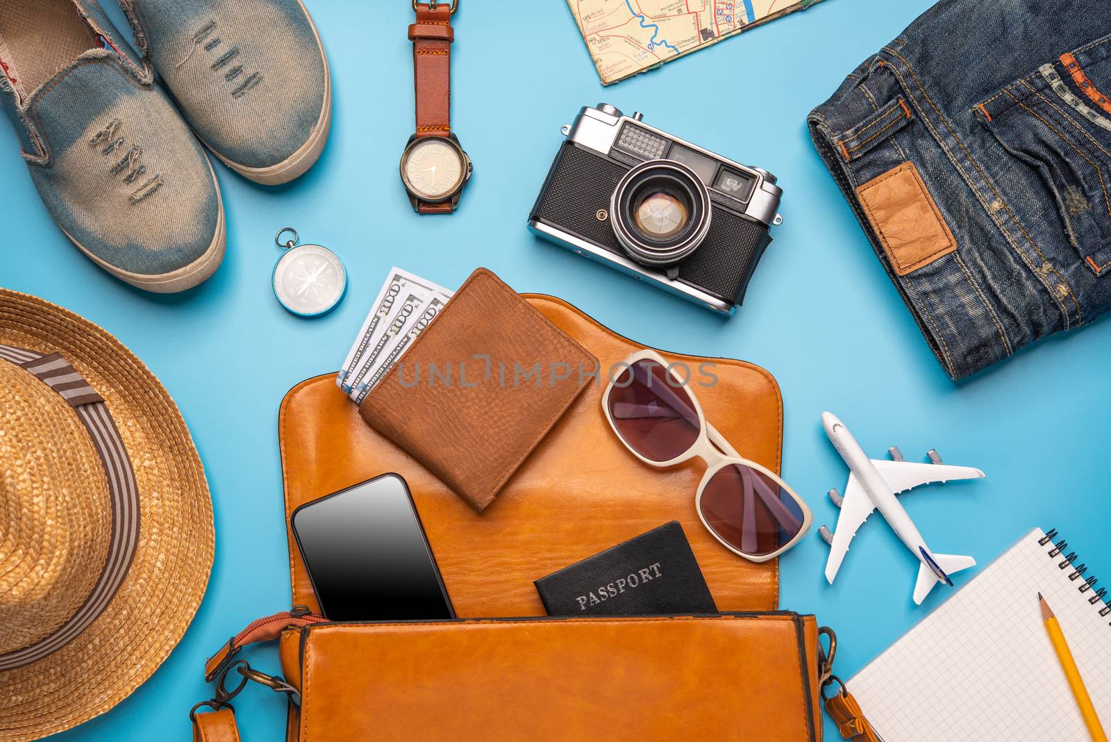 Travel accessories costumes. Passports, luggage, The cost of travel maps prepared for the trip