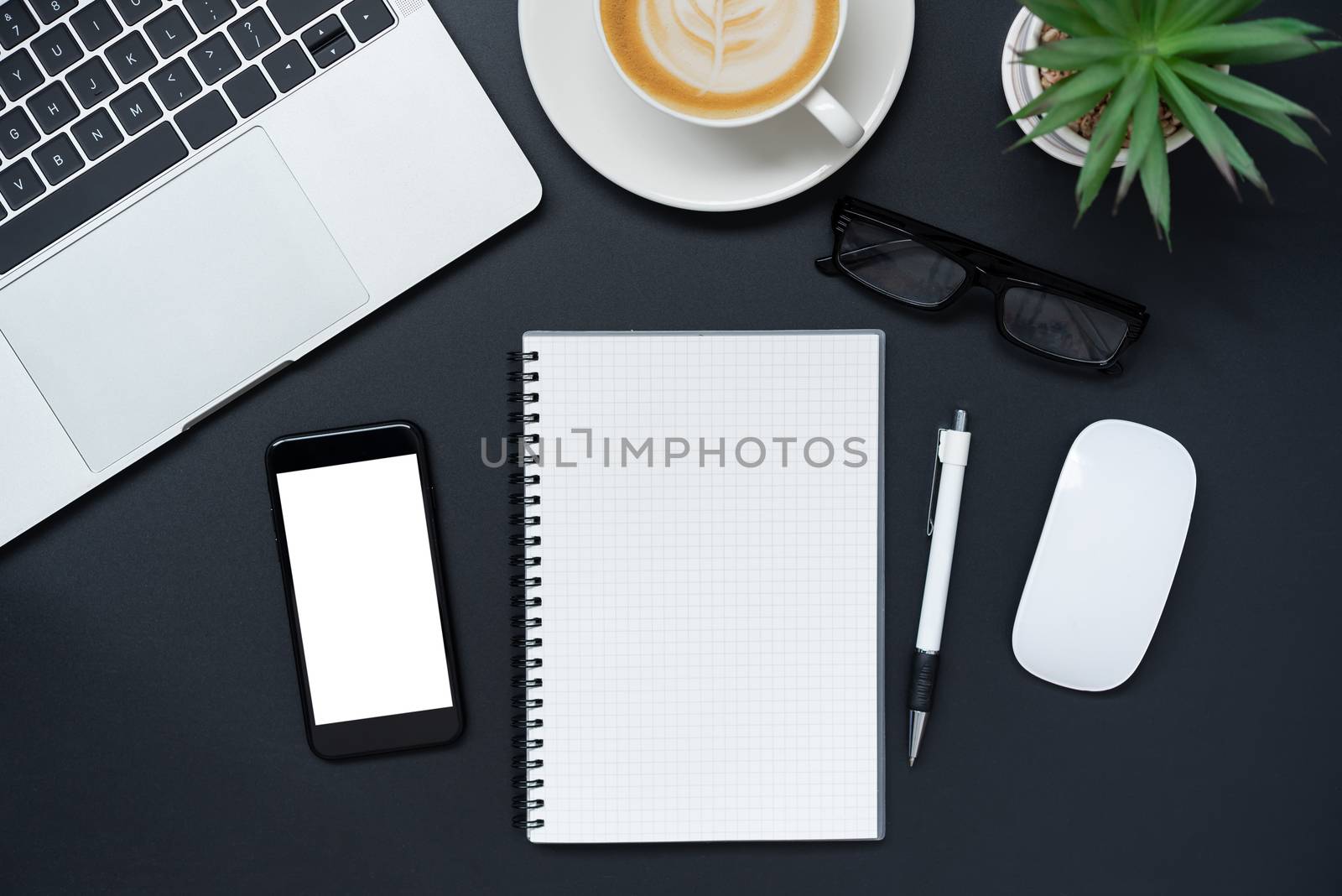 Top view with laptop, mobile phone, coffee cup, pencil, pencil a by photobyphotoboy