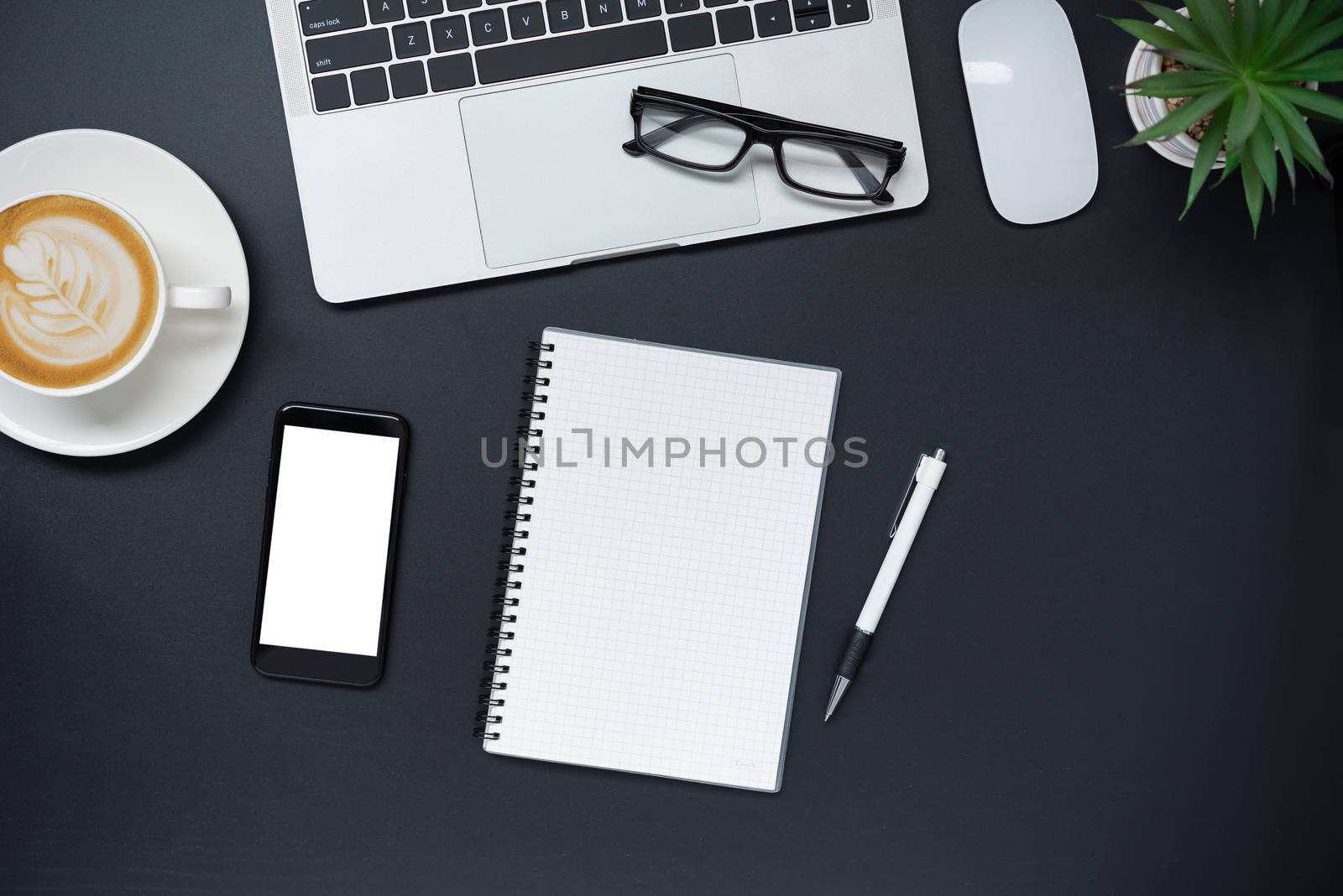 Top view with laptop, mobile phone, coffee cup, pencil, pencil a by photobyphotoboy