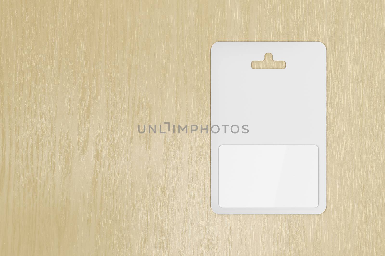 Blank gift card on wooden table by magraphics