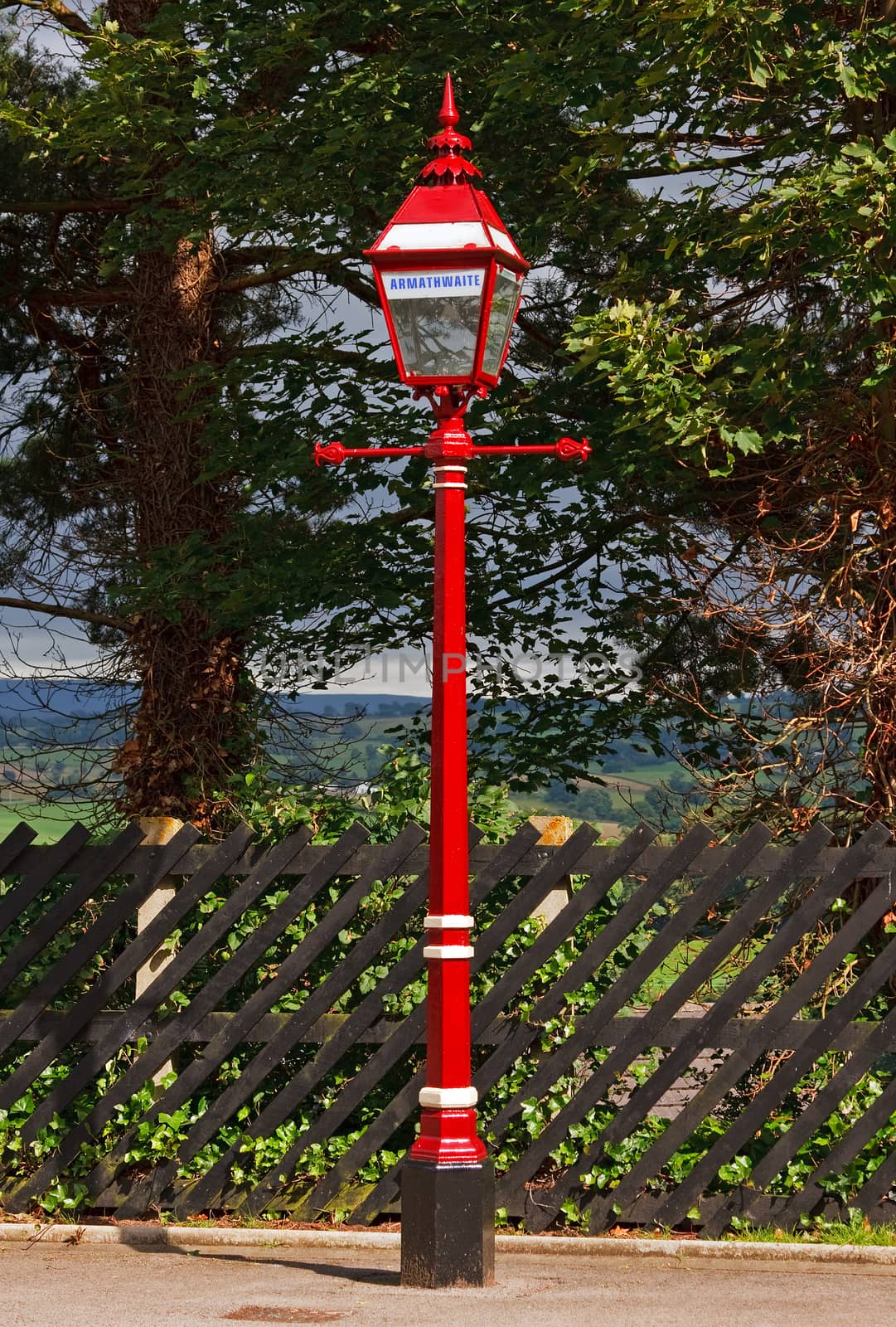 The traditional light is situated on the platform of Armathwaite station in Cumbria, northern England on the historic Settle to Carlisle railway. The line features many faithfully restored fixtures.