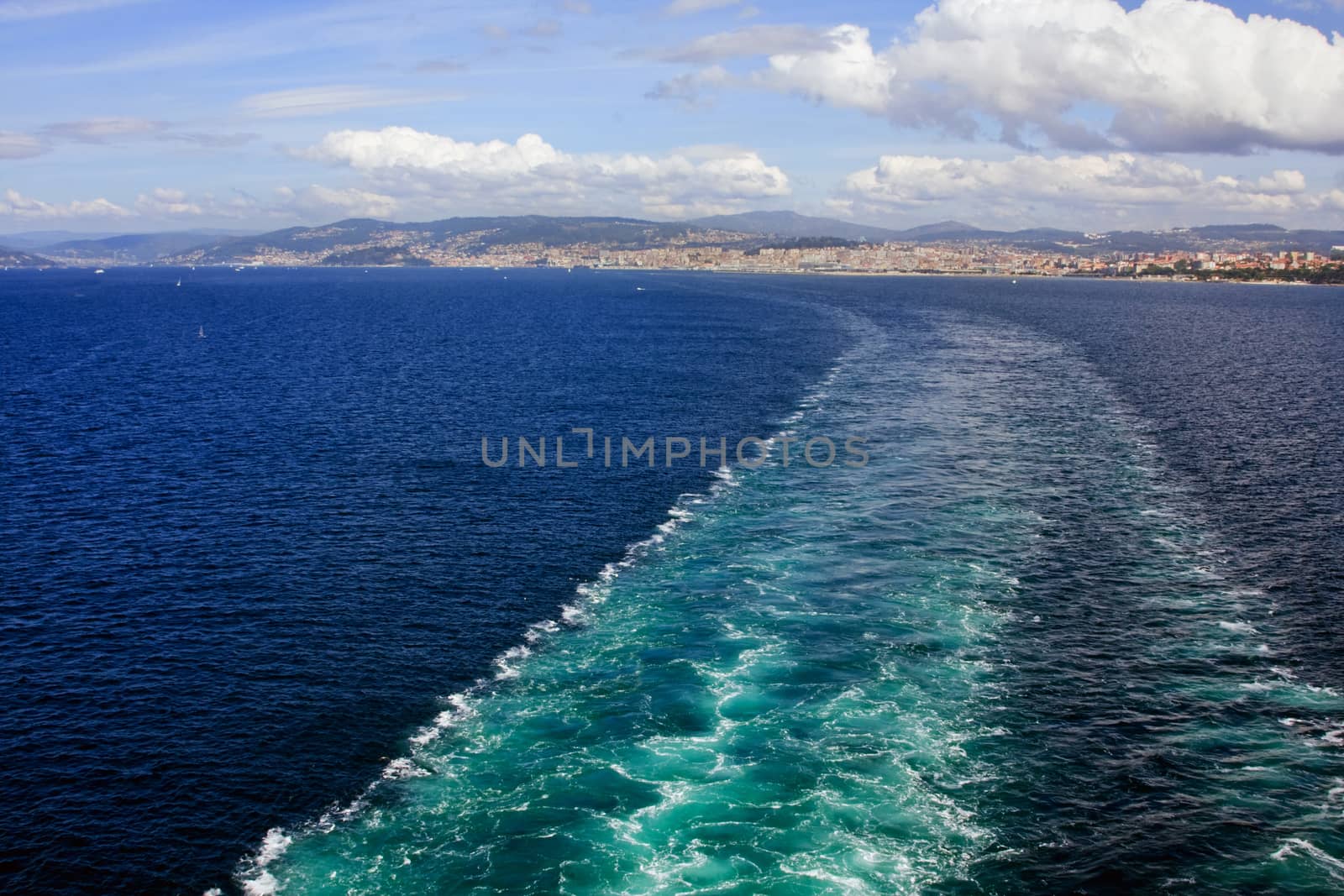 A ship's wake as it departs the port of Vigo in northern Spain.