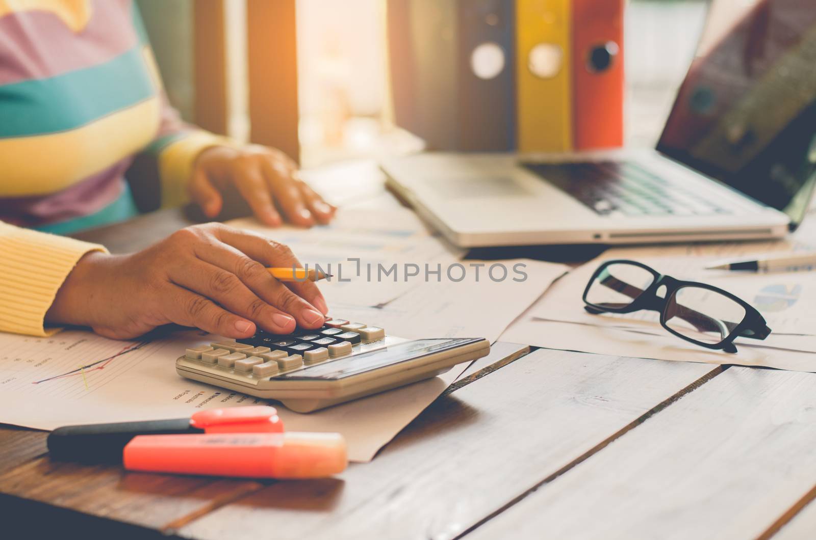 Business people using a laptop and report finance for meeting in by photobyphotoboy