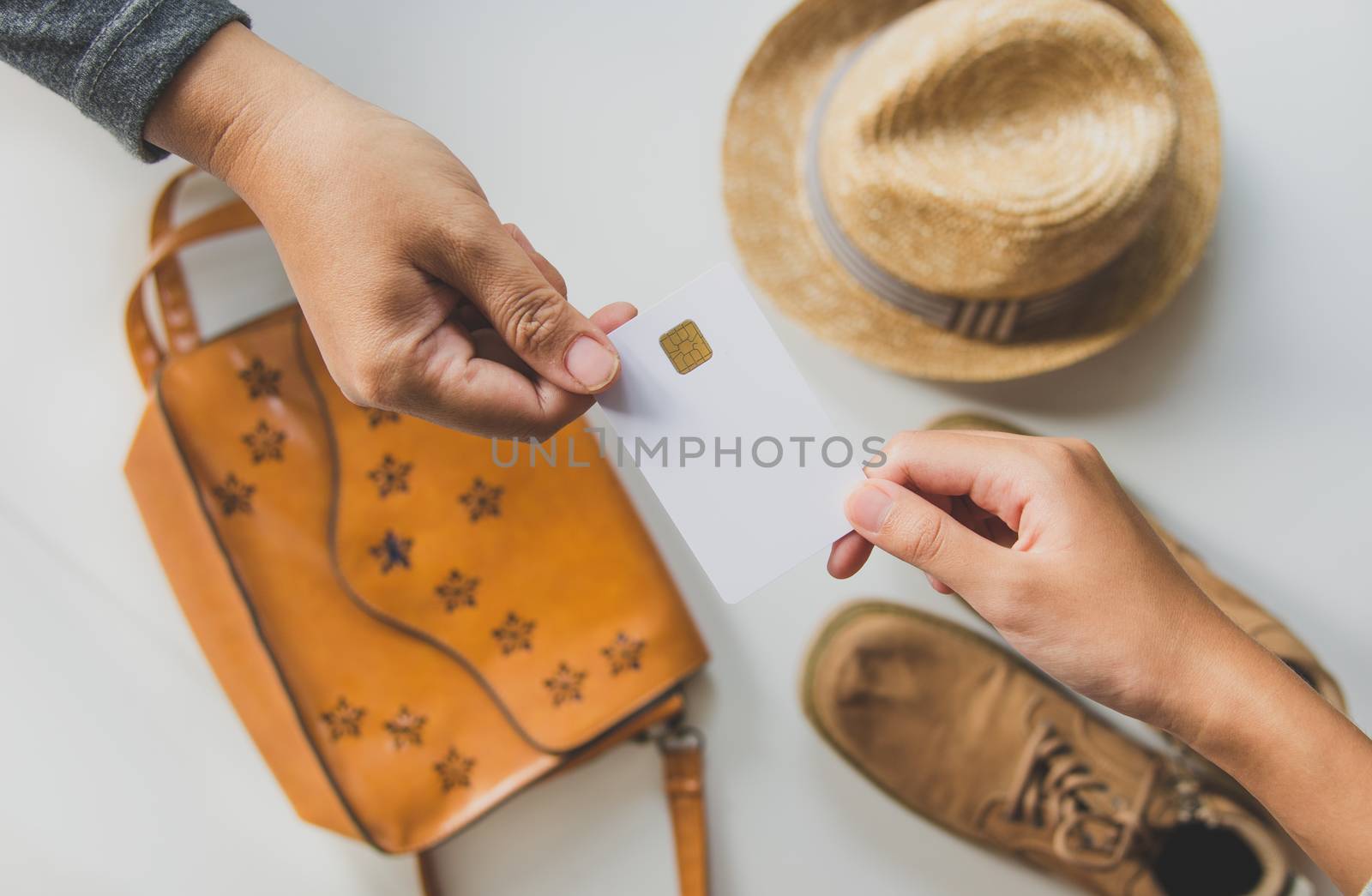 Customer paying for their order with a credit card in shopping mall. buyer give for credit card to payment for goods