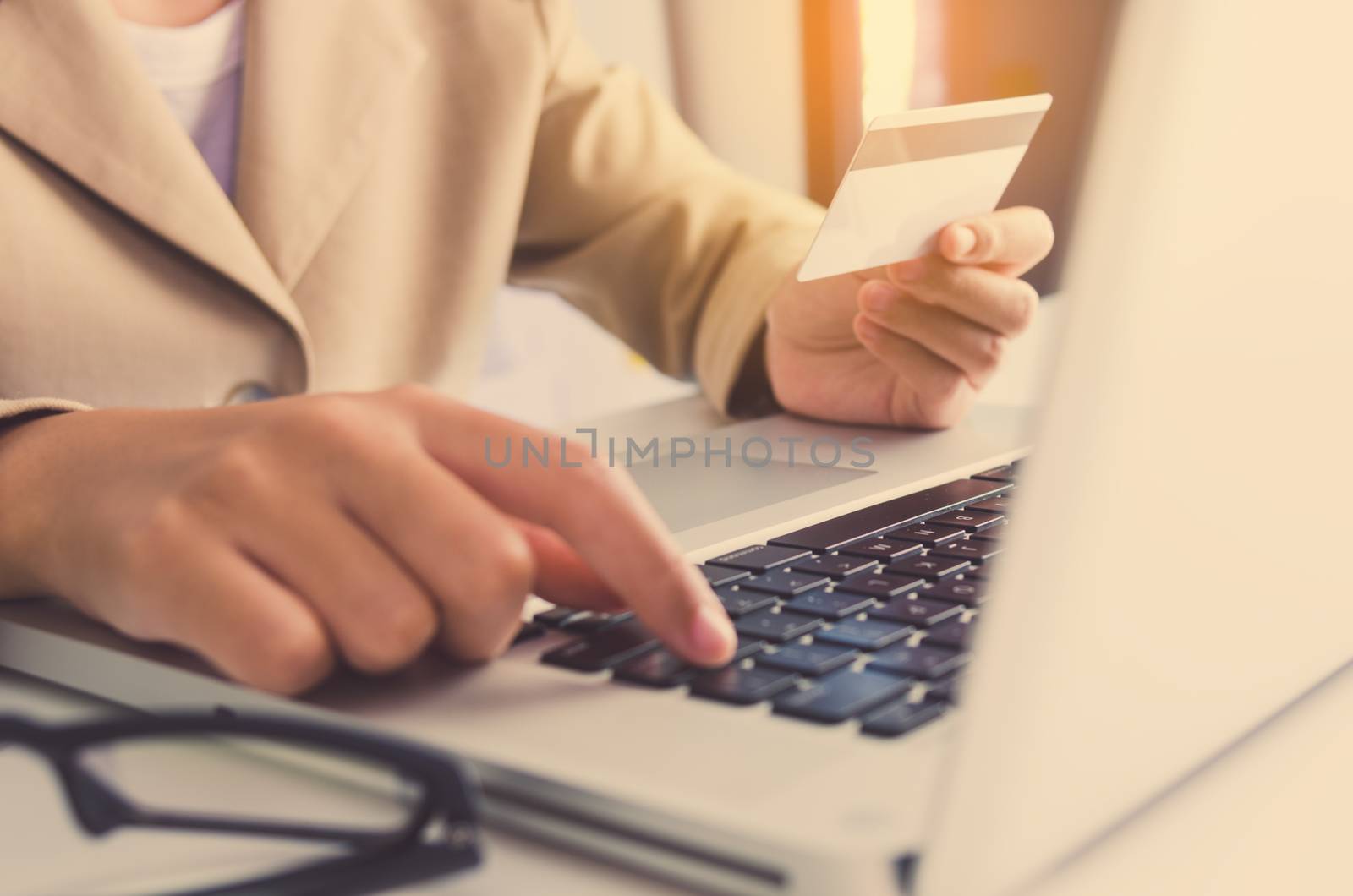 Credit Card Holders and Used Laptops Ordering and Payment - Concepts of Using Technology in Business