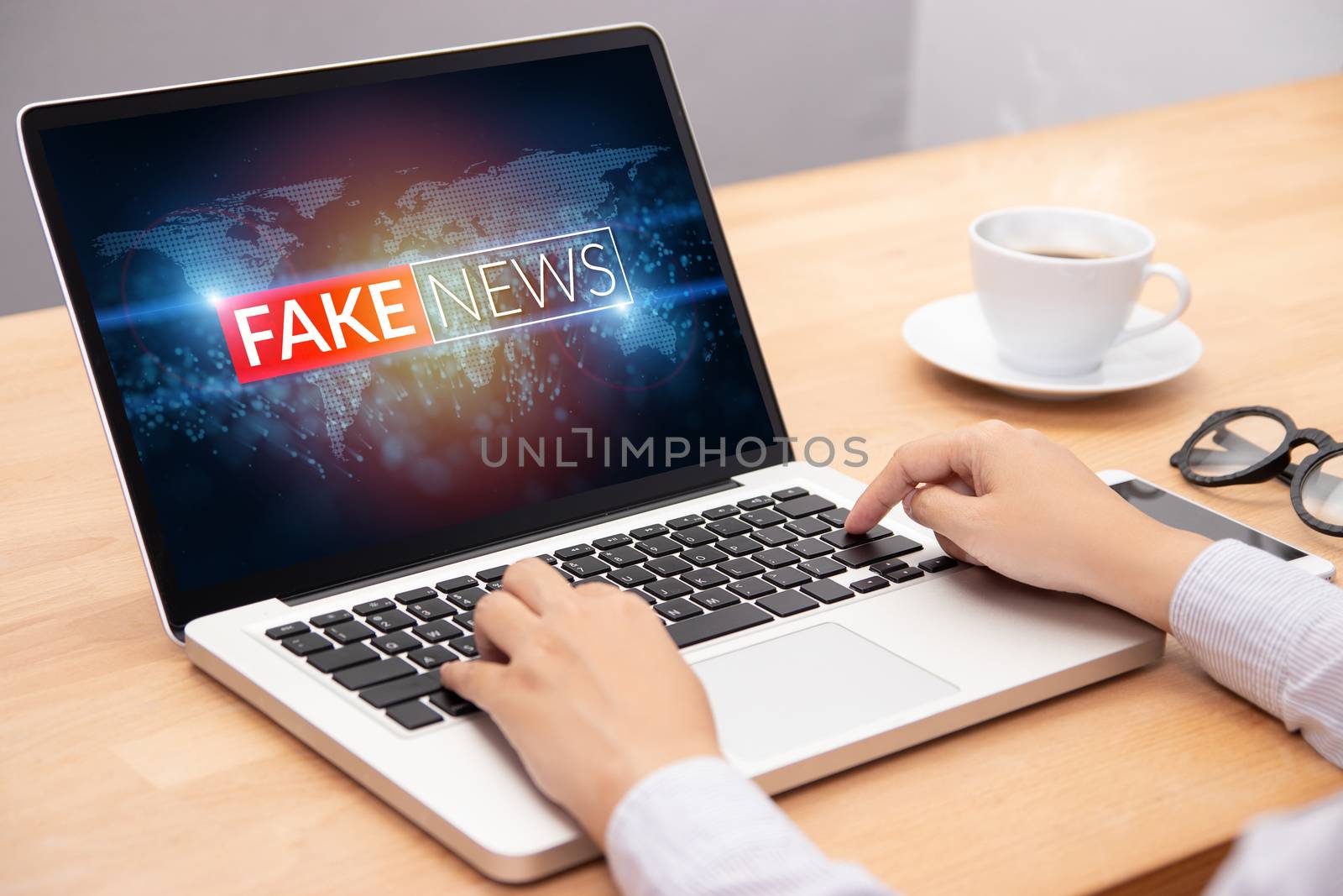 people reading fake news or HOAX on internet content via laptop 