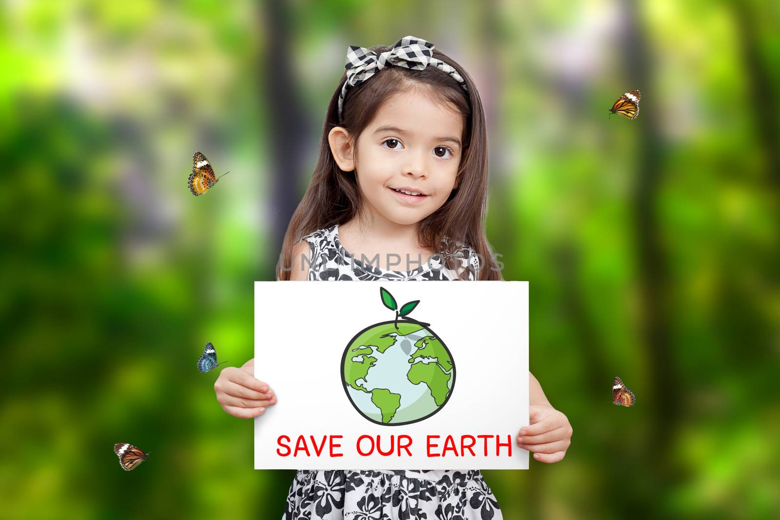 children hold paper drawing Earth and green seedling growth and word save our Earth with green tree background and butterfly flying around. children care for environmental awareness. Earth Day concept