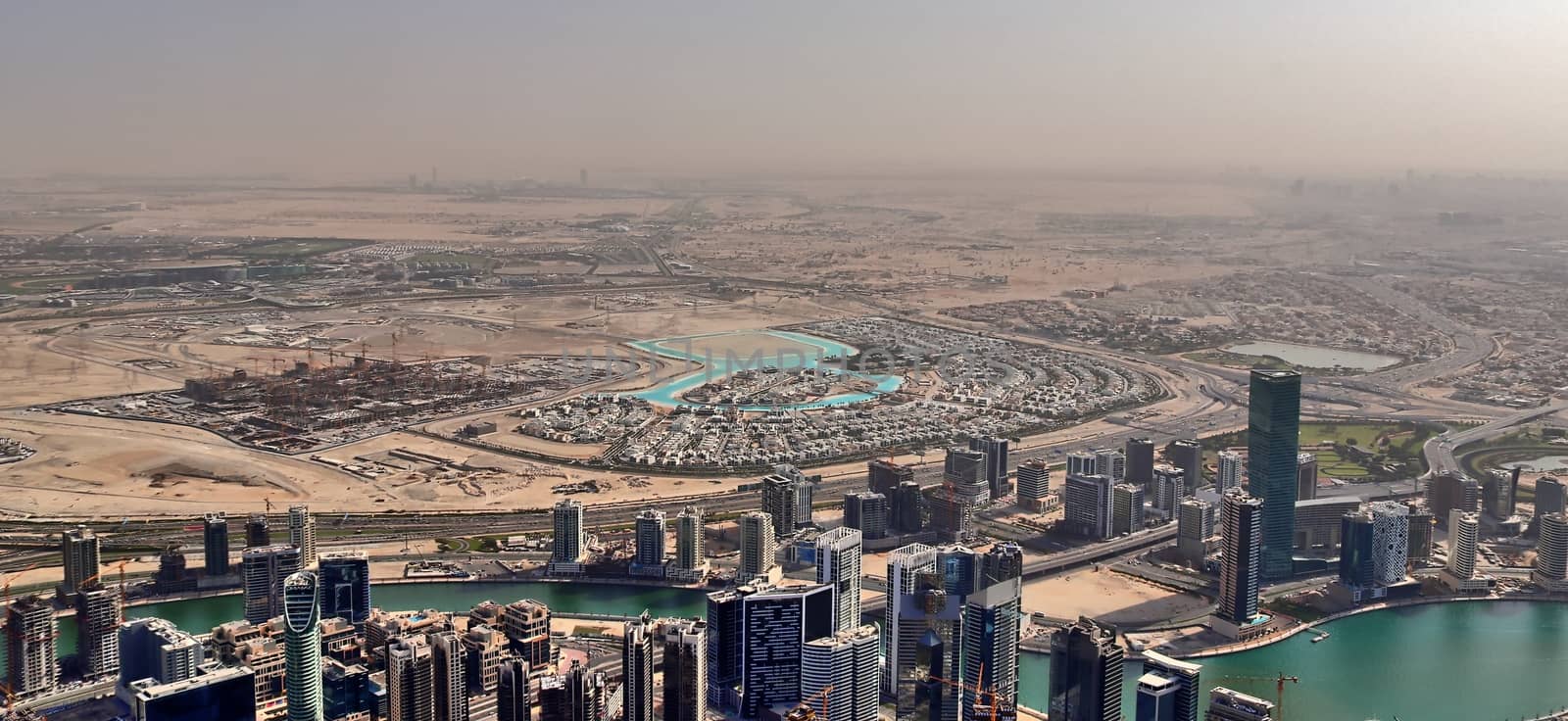 Aerial view over the city center of dubai on a sunny day by MP_foto71