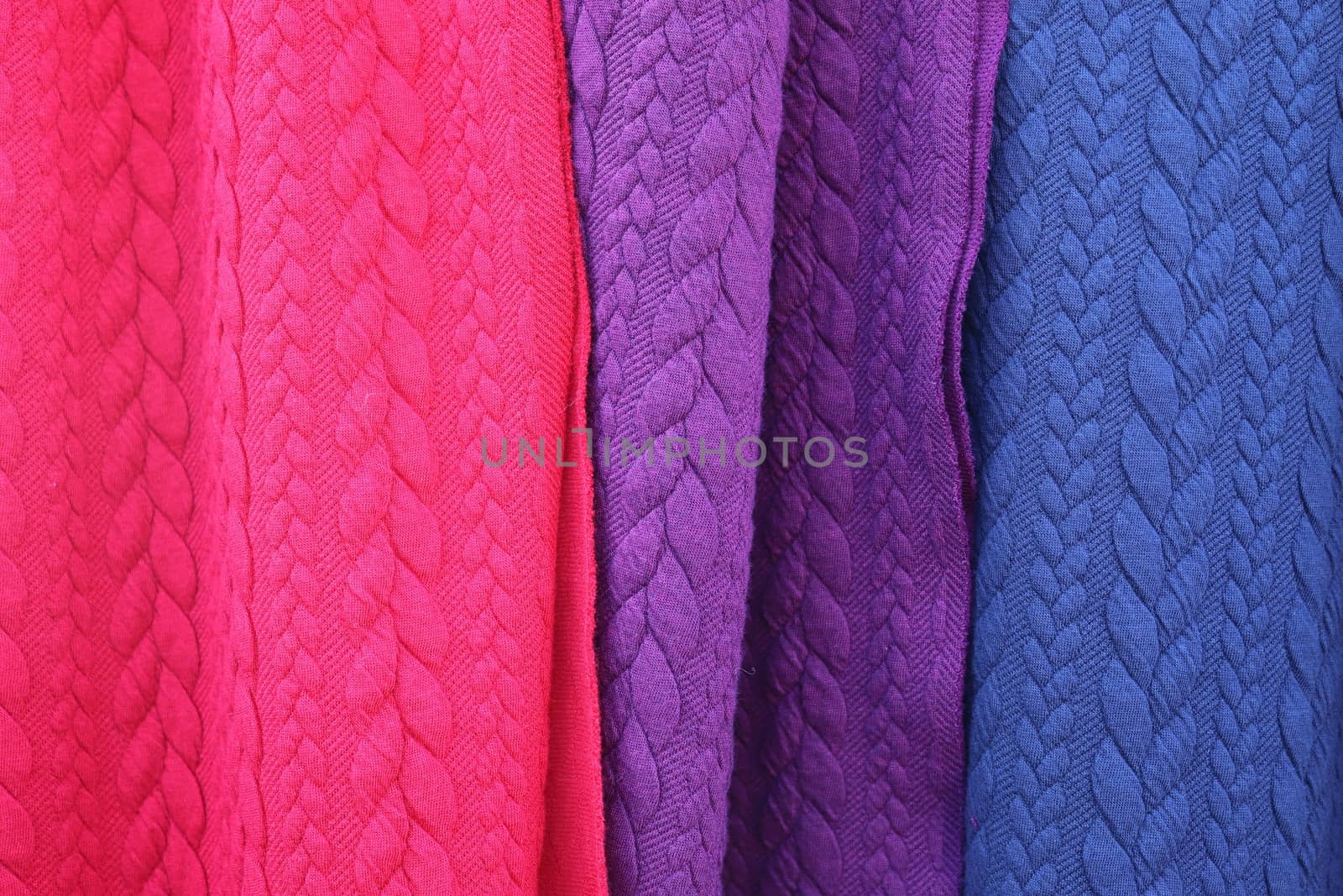 Detailed close up view on samples of cloth and fabrics in differ by MP_foto71