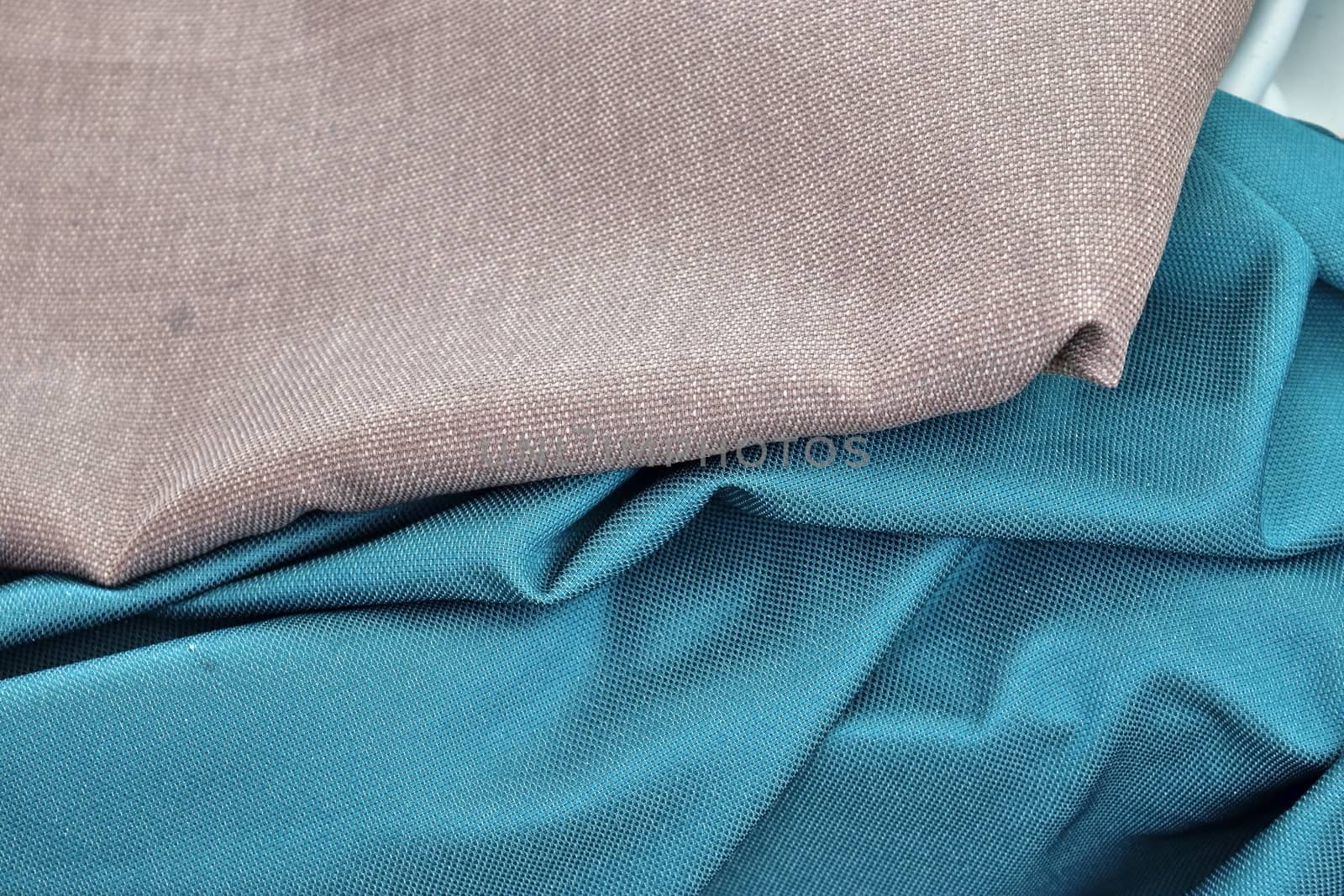 Detailed close up view on samples of cloth and fabrics in differ by MP_foto71