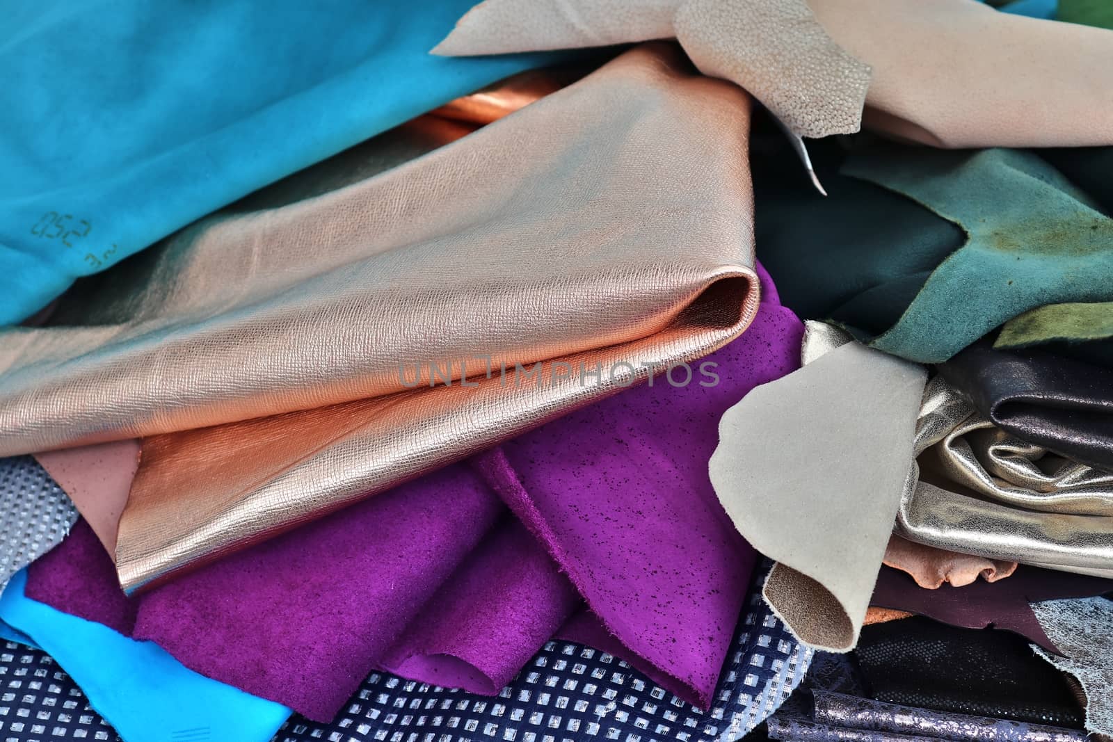 Detailed close up view on samples of cloth and fabrics in differ by MP_foto71