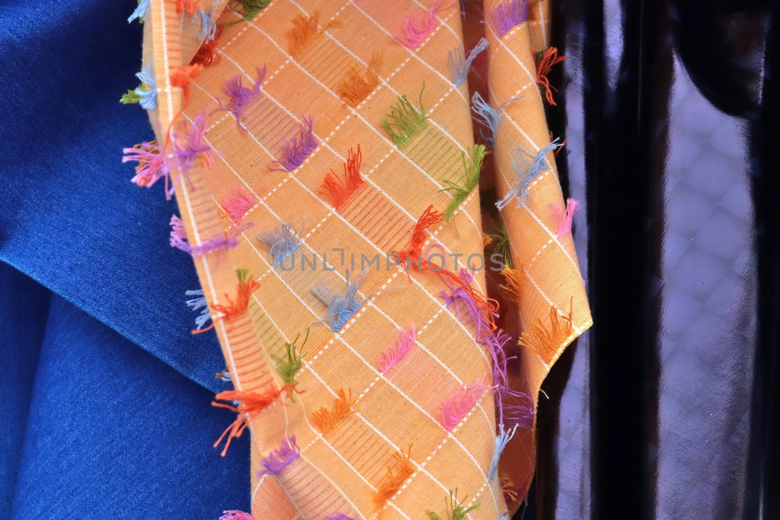 Detailed close up view on samples of cloth and fabrics in differ by MP_foto71