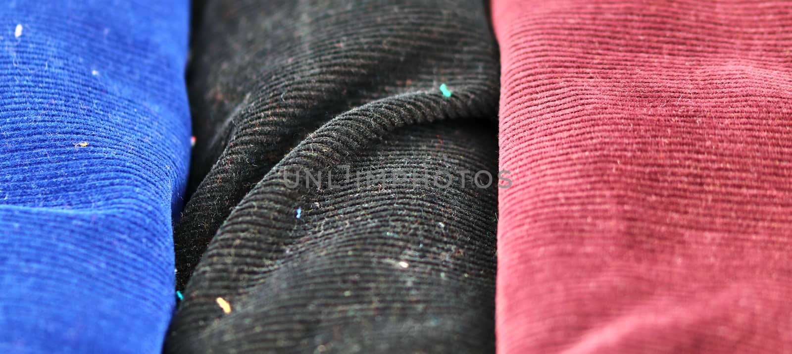 Detailed close up view on samples of cloth and fabrics in differ by MP_foto71