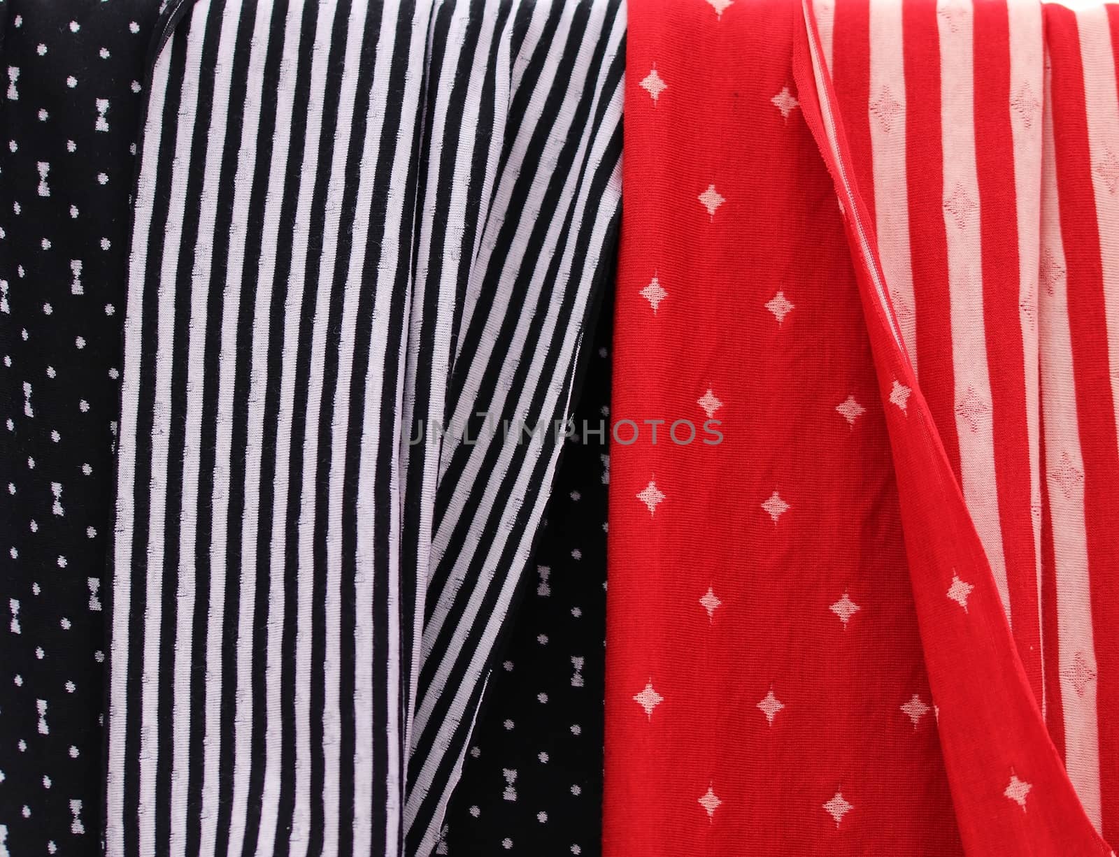 Detailed close up view on samples of cloth and fabrics in differ by MP_foto71