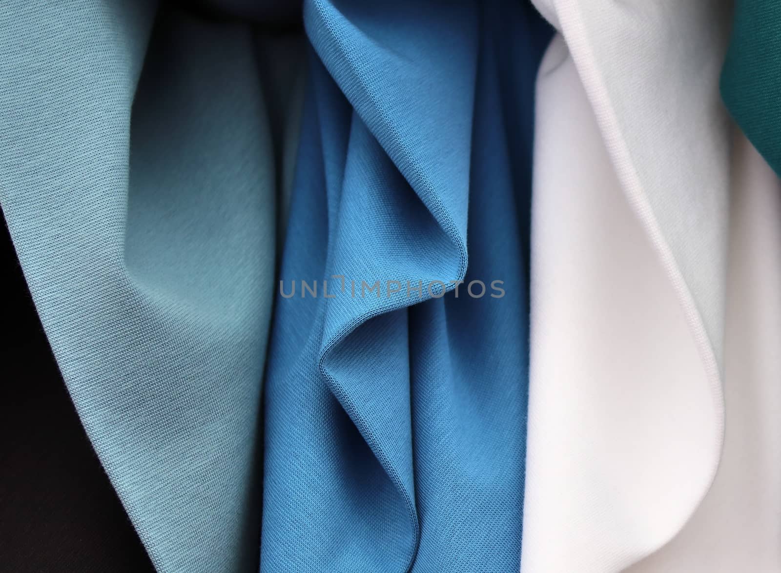 Detailed close up view on samples of cloth and fabrics in differ by MP_foto71