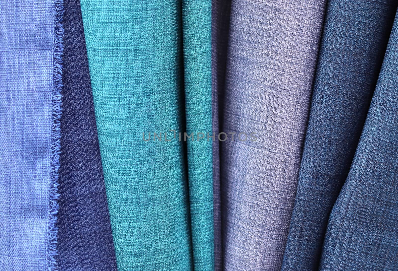 Detailed close up view on samples of cloth and fabrics in differ by MP_foto71