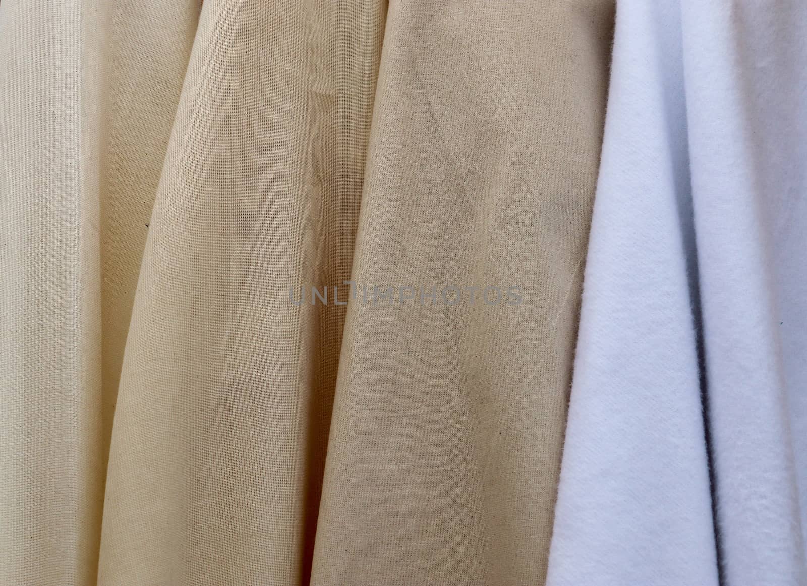 Detailed close up view on samples of cloth and fabrics in differ by MP_foto71