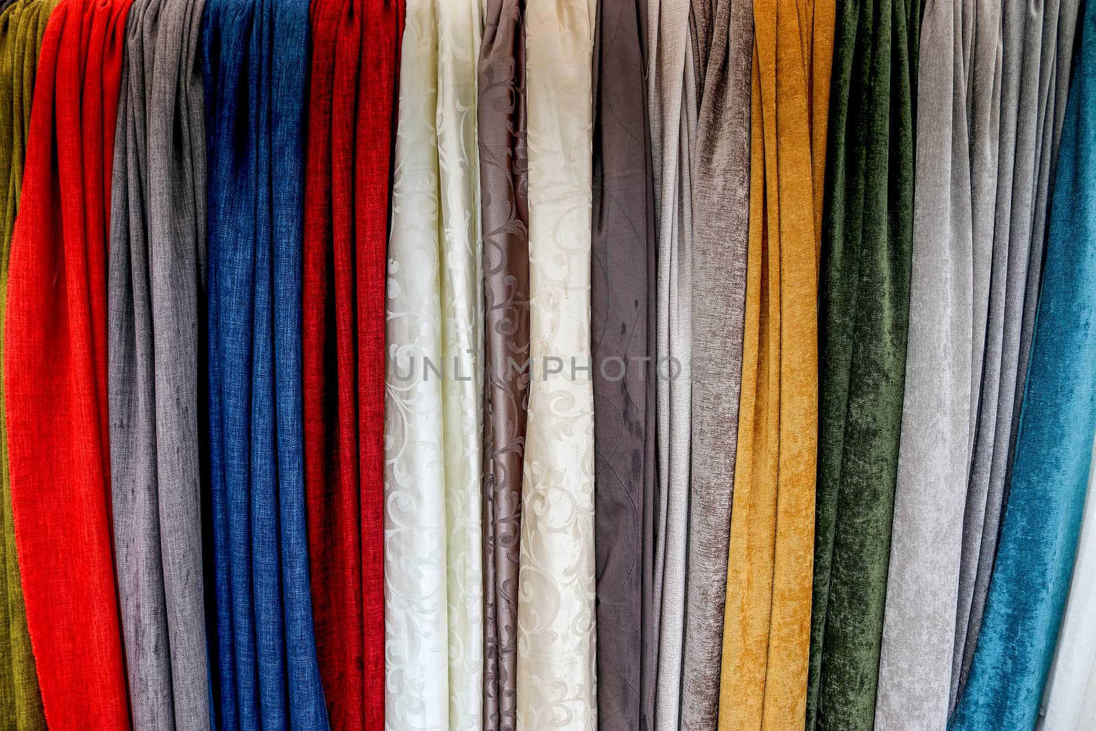 Detailed close up view on samples of cloth and fabrics in differ by MP_foto71