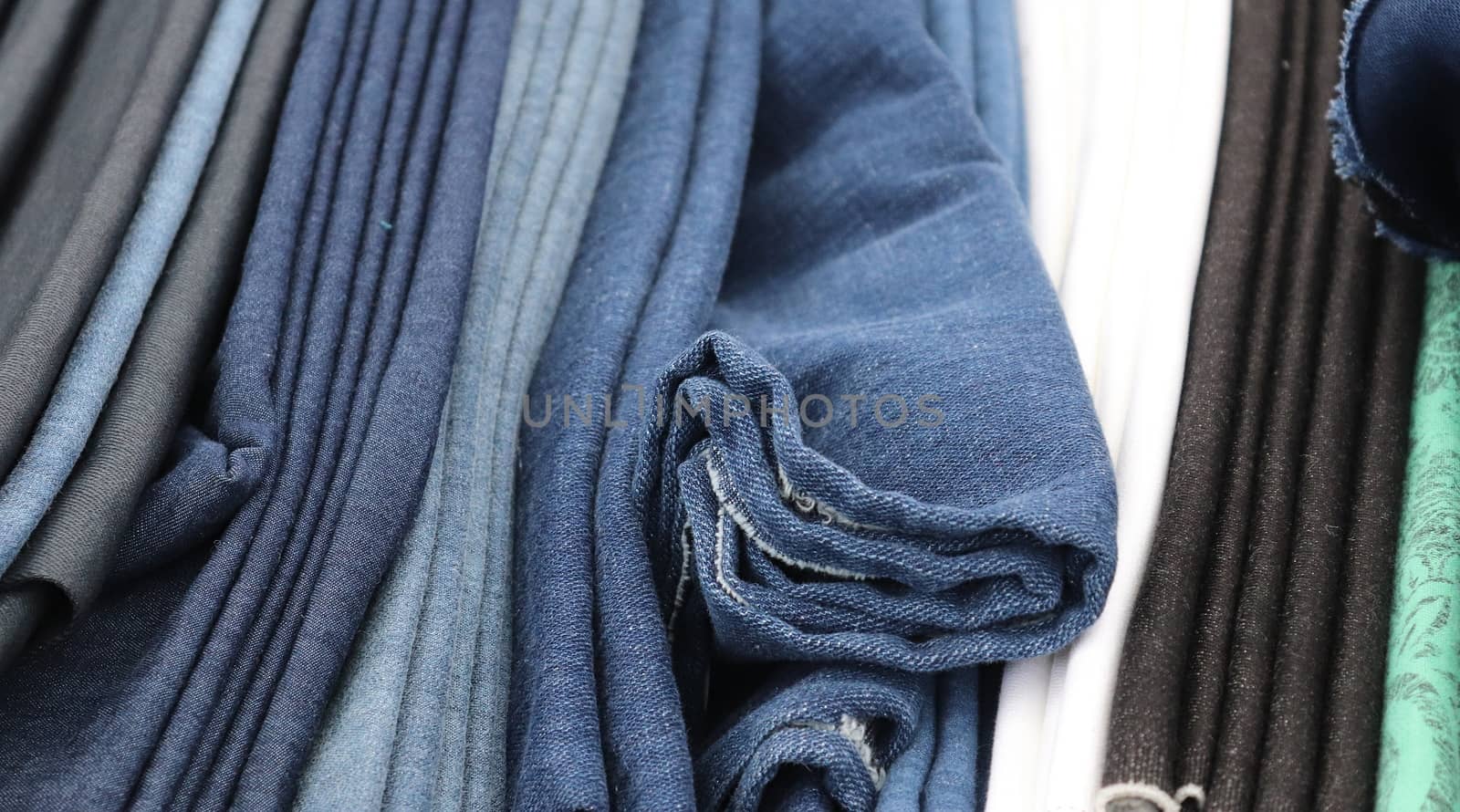 Detailed close up view on samples of cloth and fabrics in differ by MP_foto71