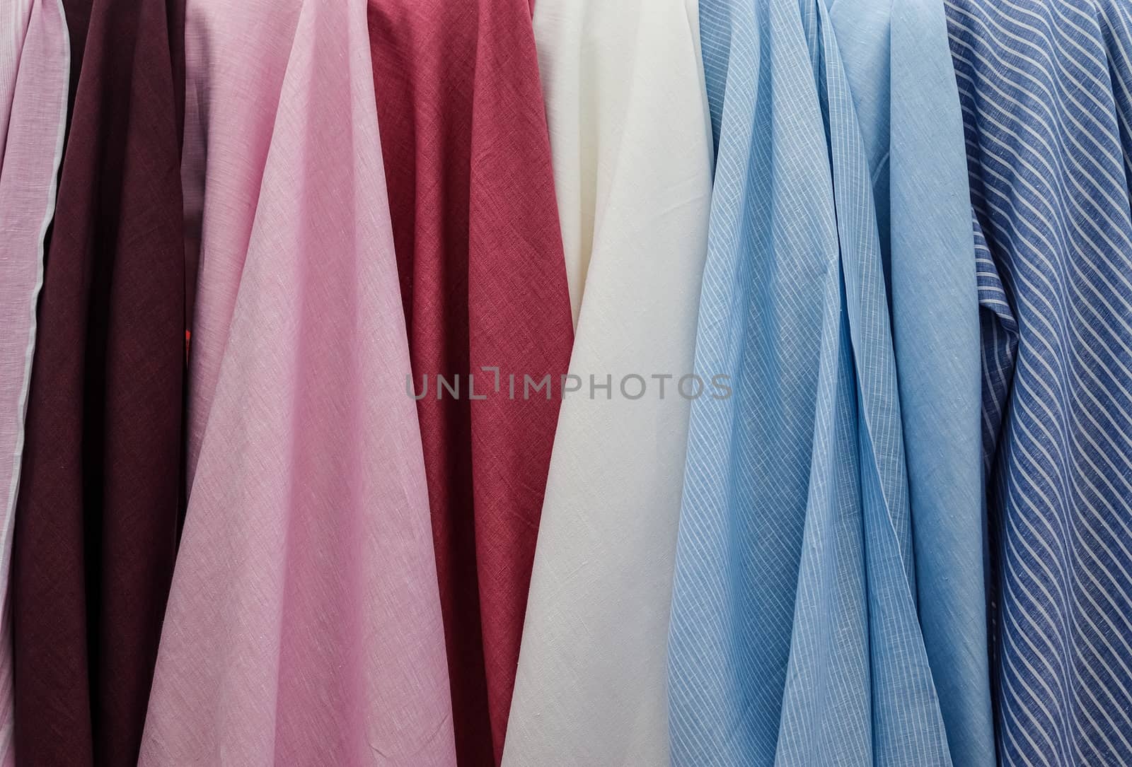 Detailed close up view on samples of cloth and fabrics in differ by MP_foto71