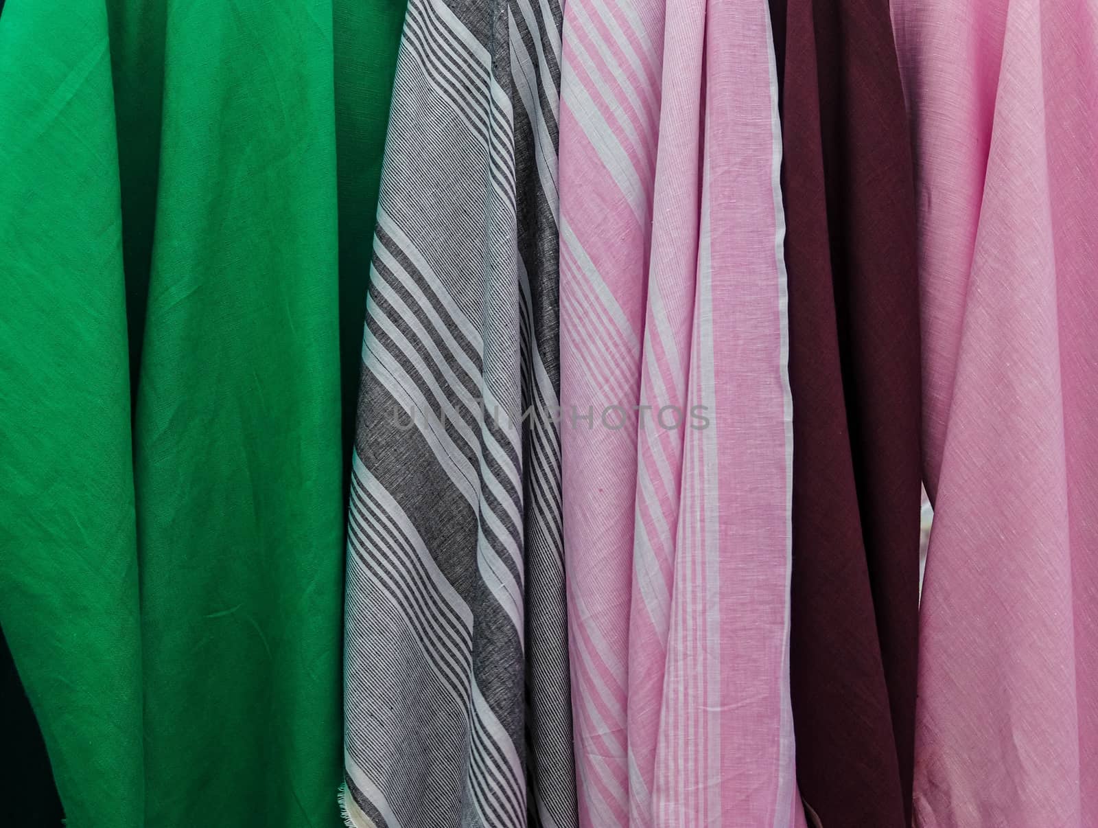 Detailed close up view on samples of cloth and fabrics in differ by MP_foto71