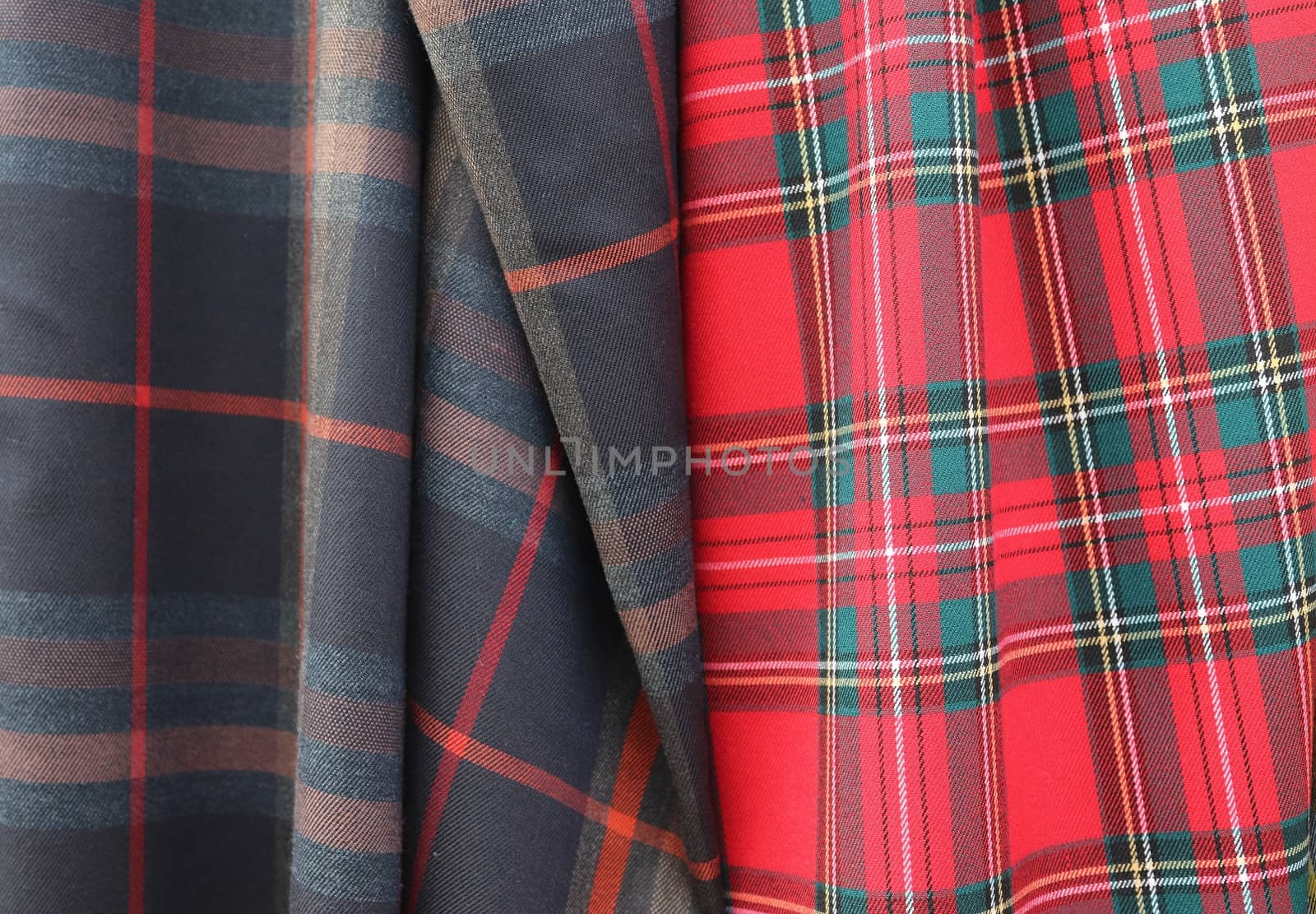 Detailed close up view on samples of cloth and fabrics in differ by MP_foto71