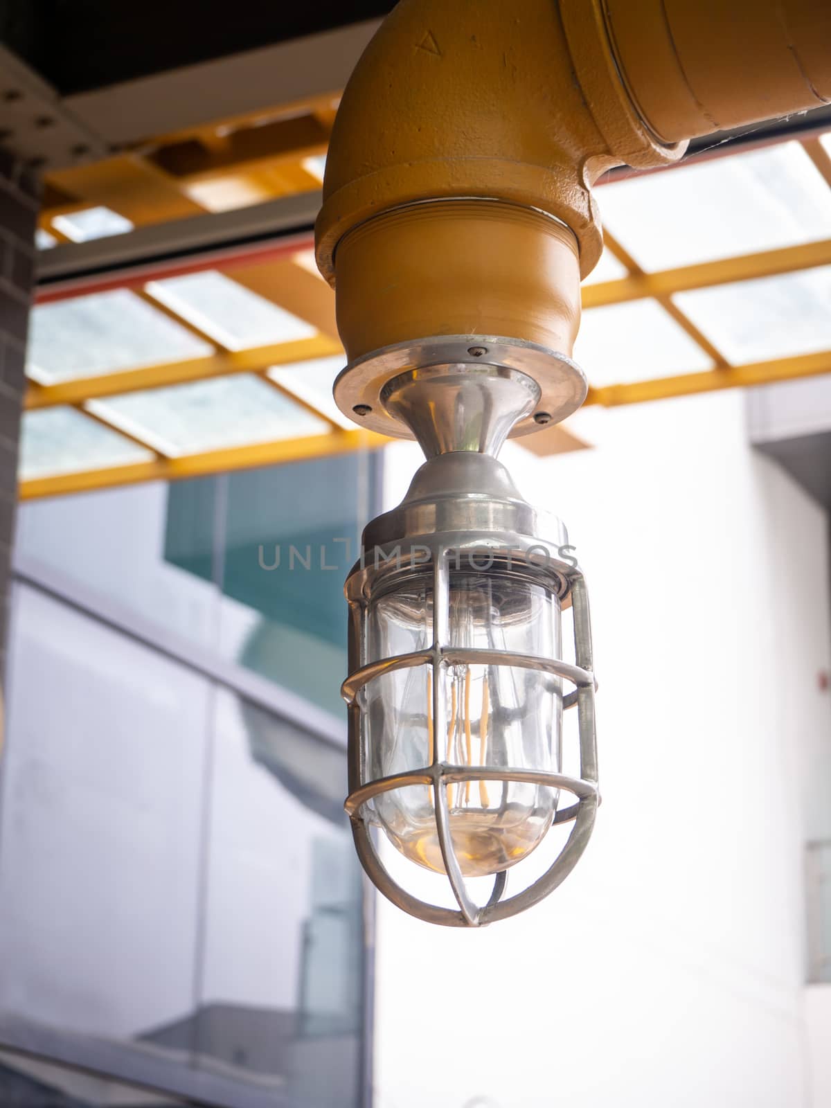 Loft style light bulbs glowing Warm light. by shutterbird
