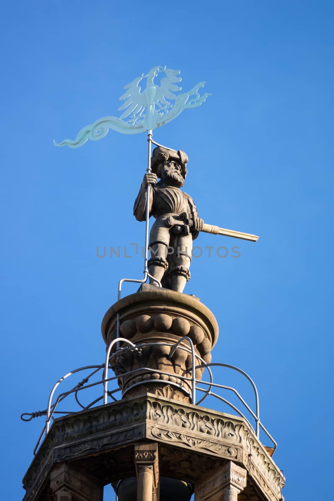 An image of a statue at the top of the Kilian Church in Heilbronn Germany
