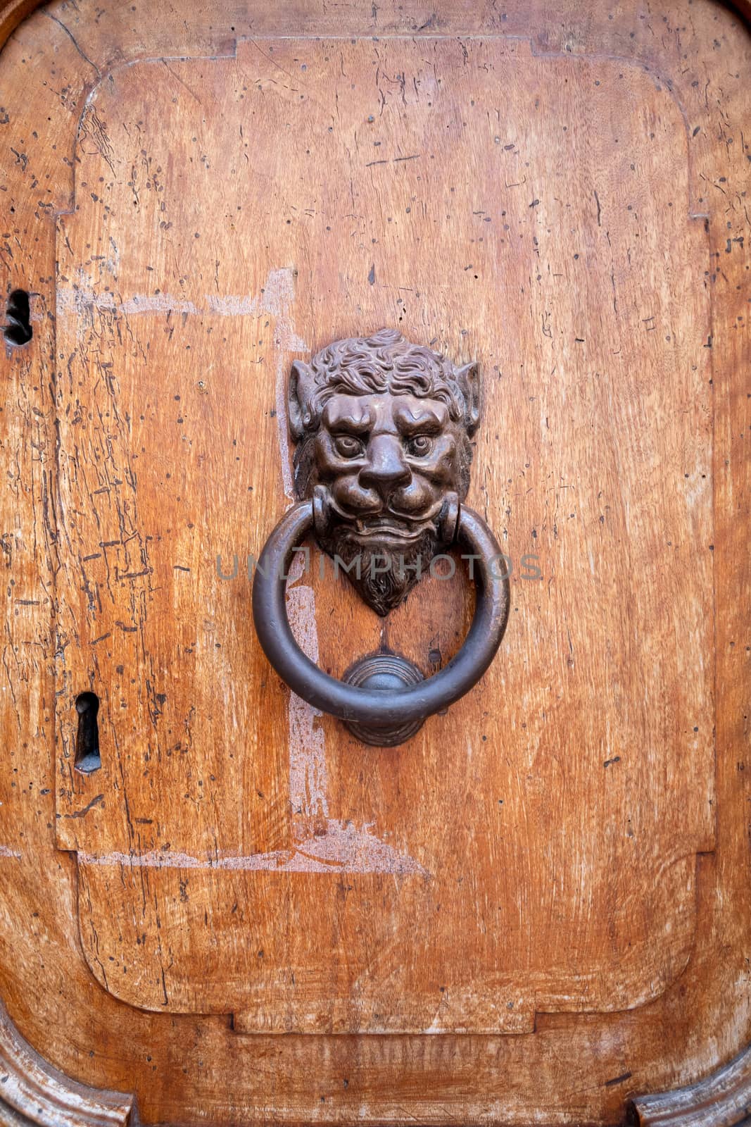 An image of an old wooden head door knob