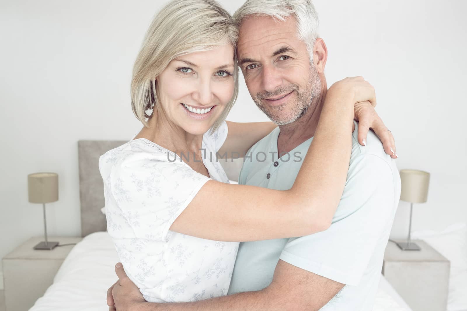 Closeup portrait of a loving mature couple at home