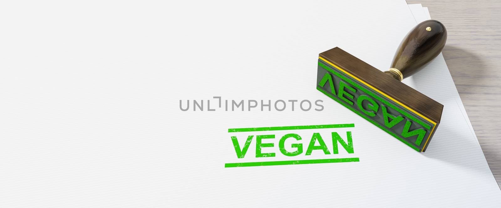 green stamp vegan on white paper background by magann