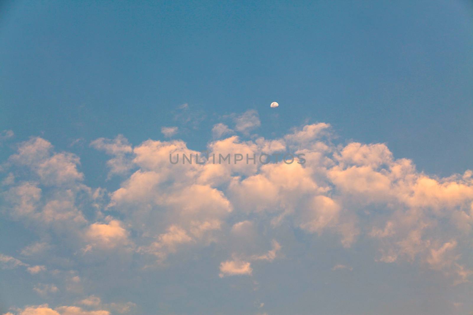 Cloudy and moon in sky before sunset for background