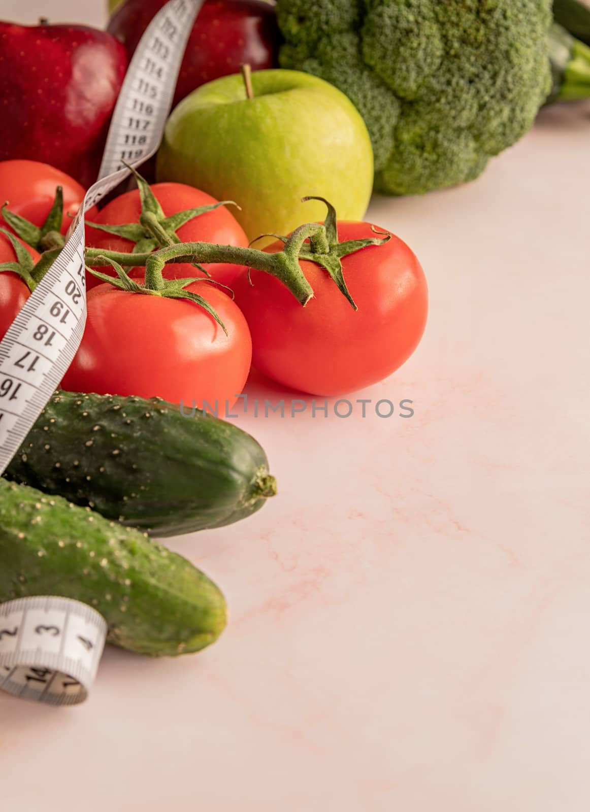 Healthy diet. Fresh vegetables and fruit for healthy diet and a measuring tape and copy space