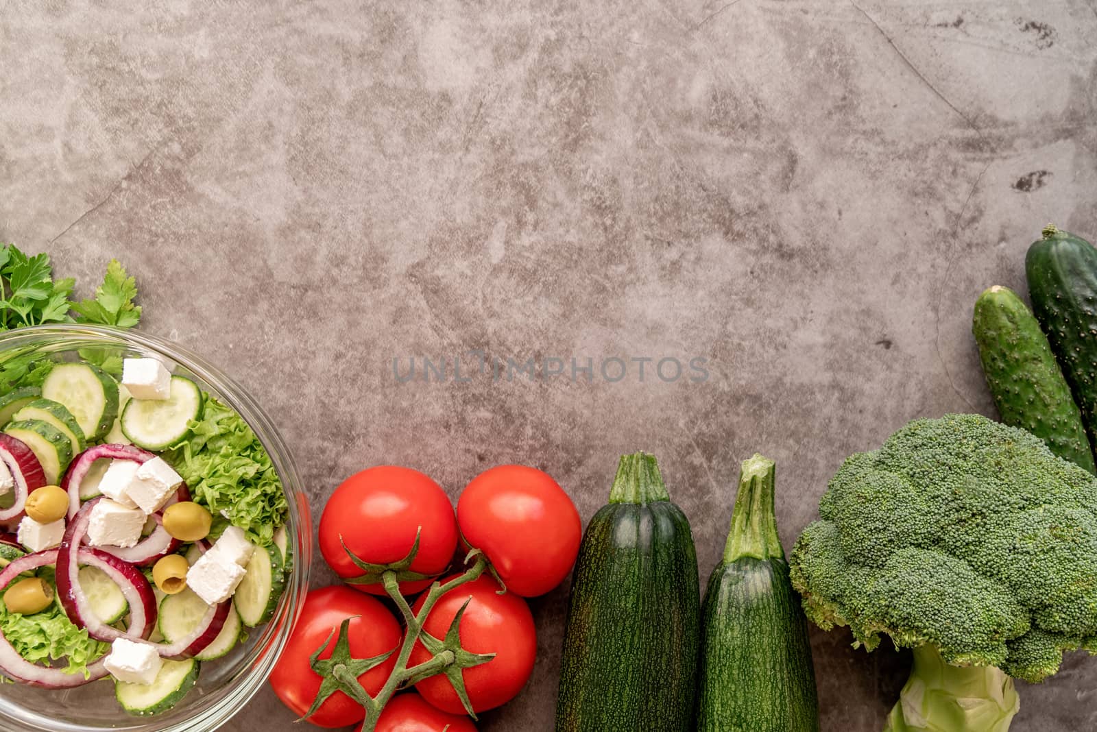 Healthy diet. Fresh vegetables and salad for healthy diet with copy space flat lay on dark background