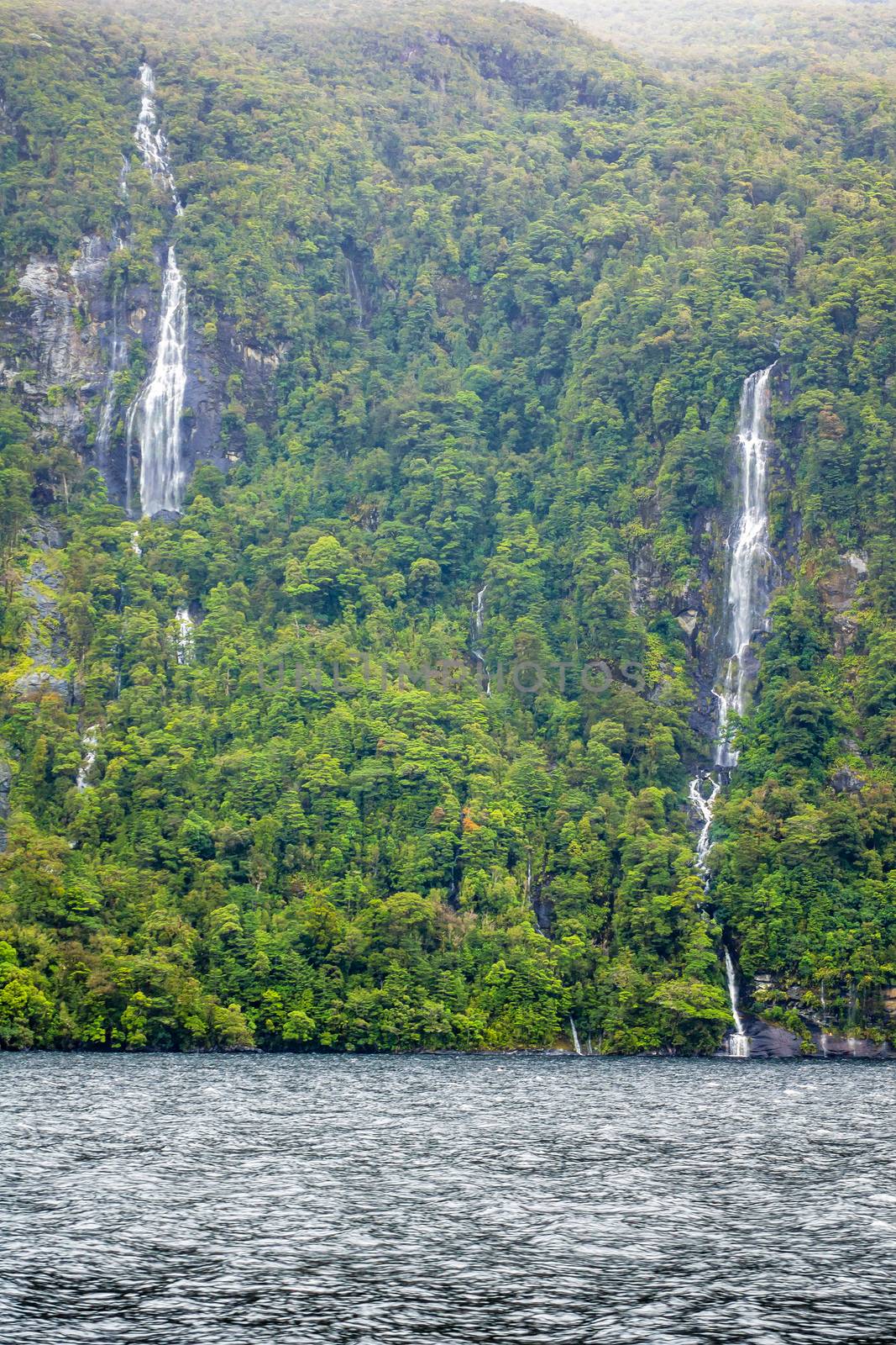 waterfall at Doubtful Sound Fiordland National Park New Zealand by magann