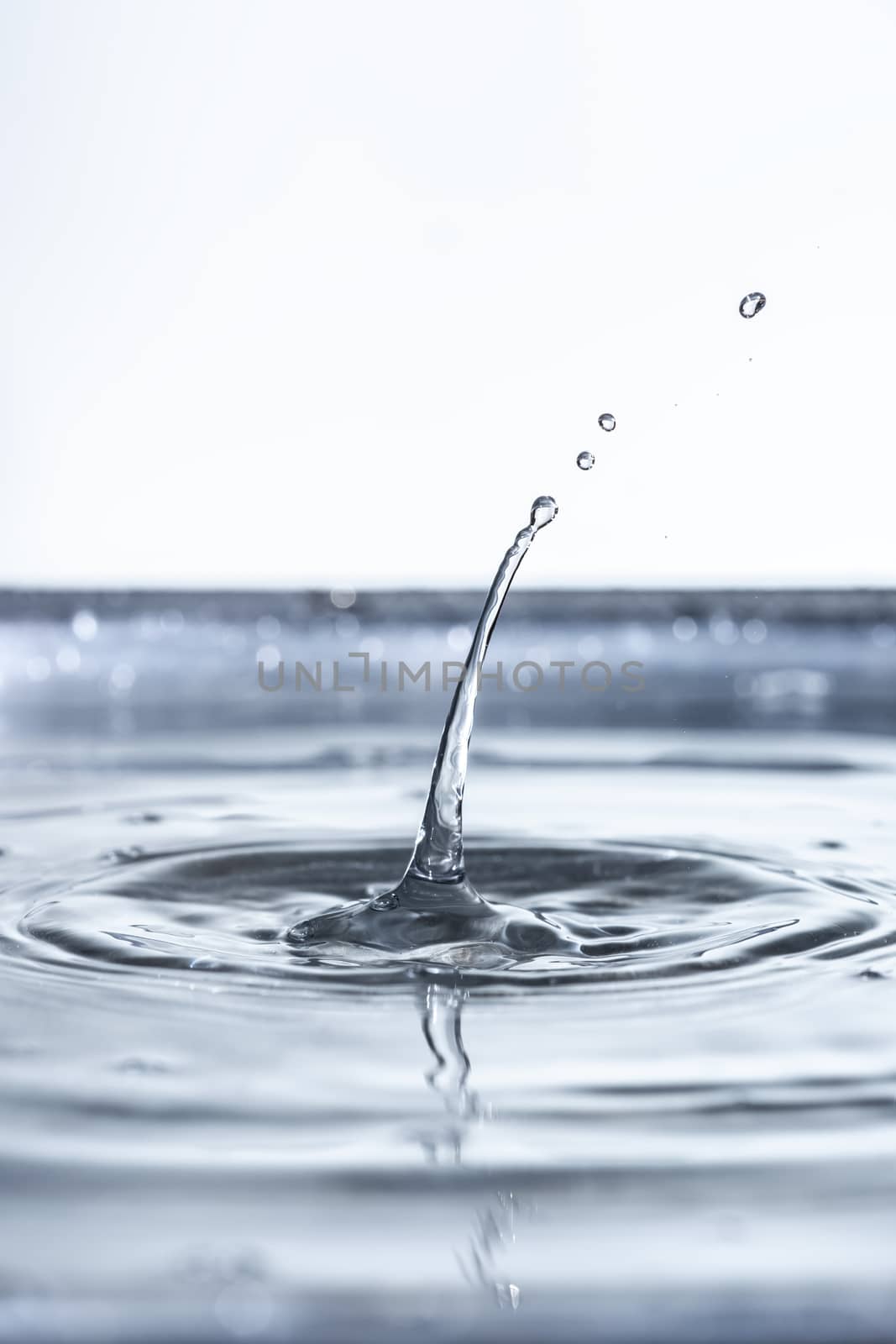 An image of a beautiful water drop background tilt